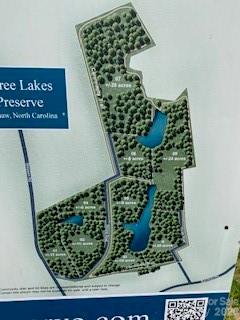 This gorgeous WATERFRONT 10+ acre plot of land IS AVAILABLE to build your dream home. 1st parcel on your right as your enter the private monitored gate.  Fully Secluded Home site for ultimate privacy.  Entrance to the 10 acres appeals to someone who feels like they have entered their own sanctuary.  Wind through this beautiful wooded land to the open view of the lake with over 766 feet of waterfront land, Handpicked by this owner to build a private estate with a separate living quarters.  2500 heated sq ft minimum.  Your view from your future home will be panoramic as you view all the hardwoods and privacy of the lots across the lake.  High elevation lot.  No flood insurance required/Soil Scientist Larry Thompson of Thompson Environmental Consulting, Inc has performed the soil core testing and approved an area for the purpose of building a 4 bdrm home, and will assist the new owner to continue to pick their site for their home and designate a specific field for septic lines and repair field according to their design and plans. Although no permit was filed, Larry Thompson can proceed with new owner to submit a permit.  See attached documents.  This neighborhood has execuive type luxury homes, and there are designated areas in the subdivison for riding trails/walking trails throughout.