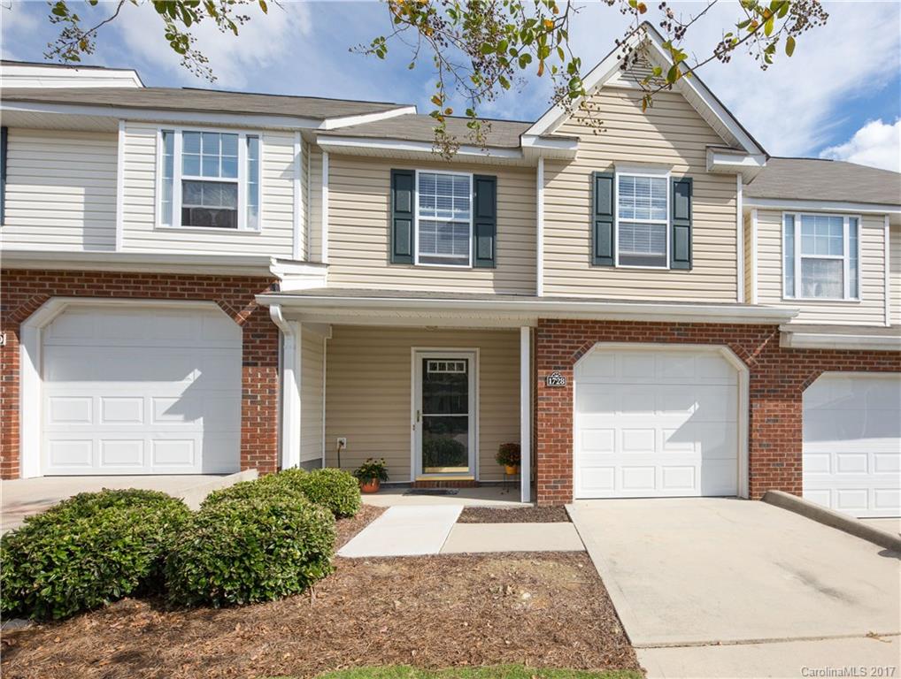 Move-in ready townhome with a one car garage!! This home features engineered hardwood flooring, neutral paint colors, granite countertops, and two master bedrooms! You're seconds from the interstate and a mile from the growing Riverwalk! Don't miss the convenience of this townhome!