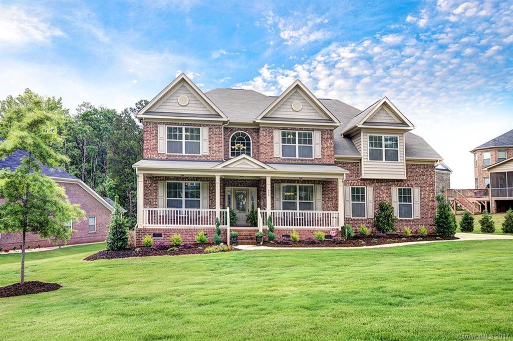 4,200sf Executive style 4 sides brick home w/ 5 bed + bonus,4.5 baths. Main floor guest rm w/ full bath & stand up shower. Oversize kitchen island,42" espresso cabinets,granite thru-out,stainless steel appliances,double ovens,gas cooktop,hardwoods on main & partial 2nd floor,both formals,coffered ceiling,butlers pantry,owner's retreat w/ sitting rm & his & her closets.Large Secondary bedrms.Home backs up to wooded common space,irrigation,tankless wtr heater,energy efficient & many more upgrades!