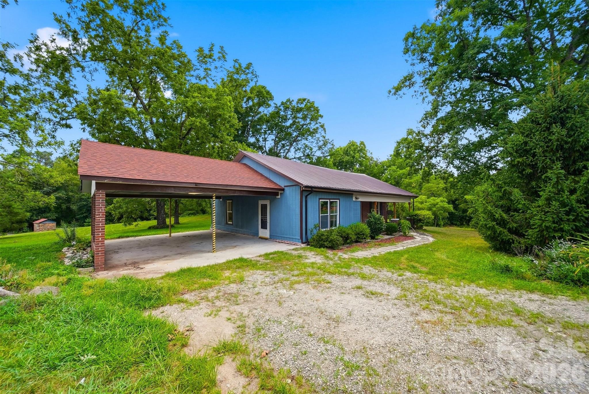 Located in the quiet, rolling hills of rural Western North Carolina, this 2 BR, 1 BA brick home on 1.98 acres is just minutes to Valdese, Rutherford College, and Hickory. A beautiful setting with plenty of room for sunny gardens and a 24' x 24' outbuilding/garage ready for workshop, storage, or outdoor toys. Recorded deeded 20' Right of Way from Rhodhiss Road into property. Public water. Home to be sold "AS IS".