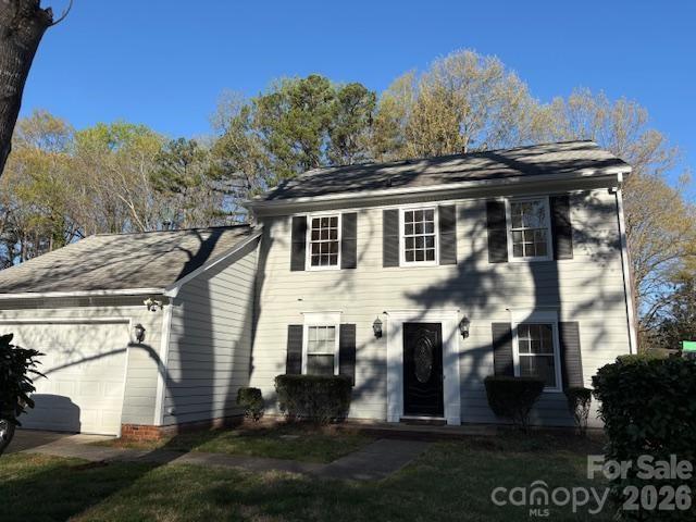 4 bedroom, 2.5-bathroom home complete with upper floor, potential bedroom suite for the teenager or perhaps a private office for Mom or Dad. Great Location in Charlotte, this beautifully sits on a Large Level Lot in a quiet neighborhood and has convenient access to main roads, shopping, and dining. The home itself has a very good floor plan, key features include updated kitchen appliances, eating bar, exhaust fan, side by side refrigerator and light fixtures. The modern fireplace adds warmth to the spacious family/living room. Notable features worth commenting about are, house was painted inside and out in the summer 2025, the HVAC system was replaced in 2017 and is a central zoned system for efficient temperature control, the roof was replaced in 2020, the plumbing is copper and hot water tank was replaced 2/2026. Home includes an attached garage, painted floor, outside access door, shelving and electric garage door opener plus indoor entrance to the kitchen, ceramic and hardwood flooring, also updated. The kitchen opens to a relaxing deck, with a view of the large level partially fenced private backyard creating a perfect space for relaxing, entertaining, or play. The primary suite has an ensuite bathroom, double sinks, walk in closet, and a dedicated laundry area. Please note that while the third floor is extremely usable however not all ceilings on the 3rd floor have 7' or greater ceiling height so expect the appraiser to use roughly 1,700 total heated sq foot give or take. There is available 100% FHA financing + 5% buyer assistant money, agents please read Agent Remarks.
