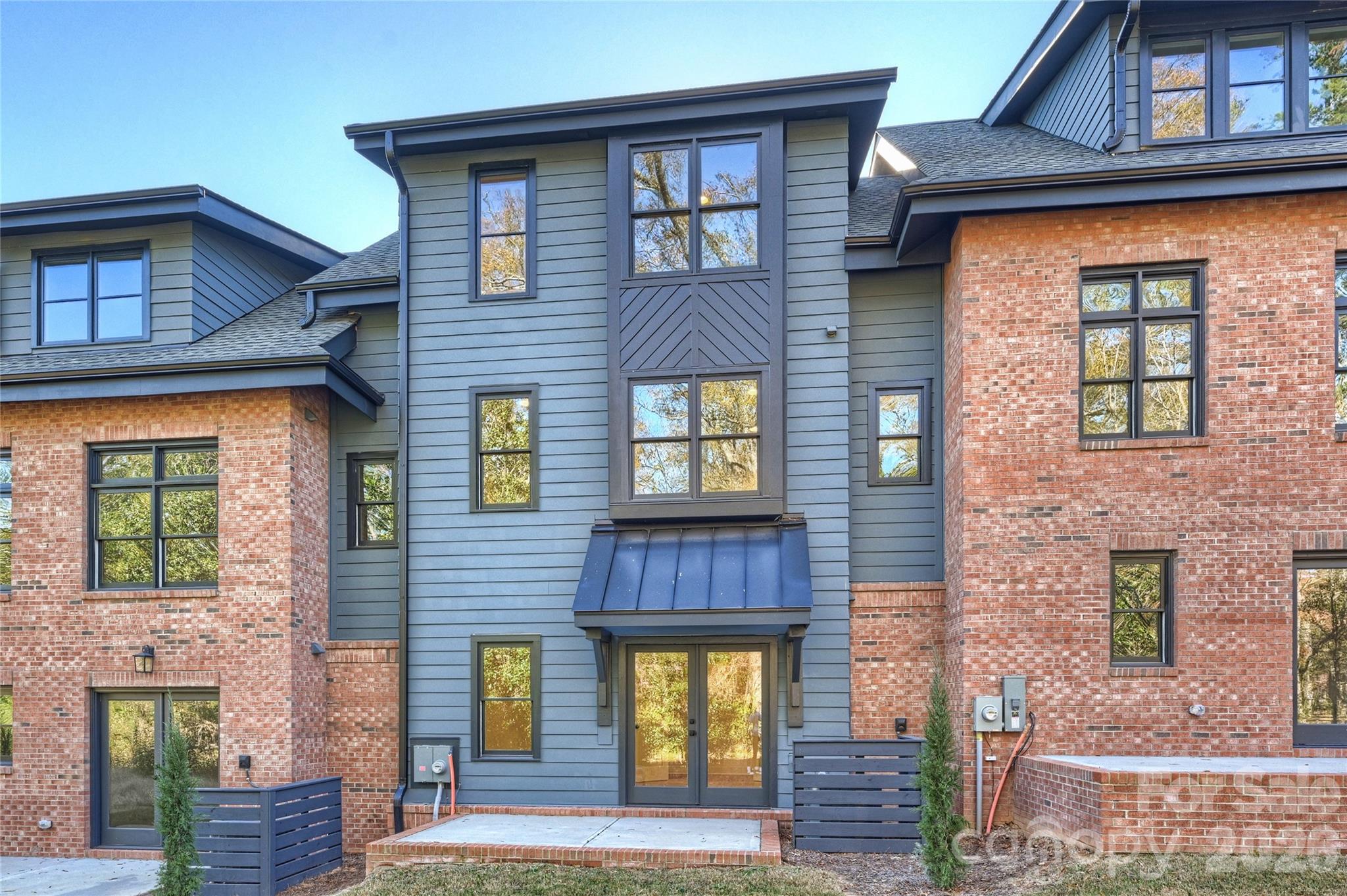 Live next to the historic VanLandingham estate. Townhomes custom designed for historic Plaza Midwood. Created to compliment neighboring historic estate and surrounding home with the help of the Historic District Commission and granted full approval for design.
Welcome to The VL Residences, a property of rare gifts and unmistakeable character at the core of Plaza Midwood.  Designed to embrace the amenities and landscape of the surrounding estate, this one of a kind new construction development looks to create its own presence while complimenting the history of its surroundings. 
Live in a newly constructed home, which ensures the project stays in line with the character and features of the neighborhood. These homes are beautiful from top to bottom. New South Home helped create the same timeless design with an updated flair to the interior selections. Schedule an appointment today and come tour the grounds and see the most unique option in the Neighborhood.
