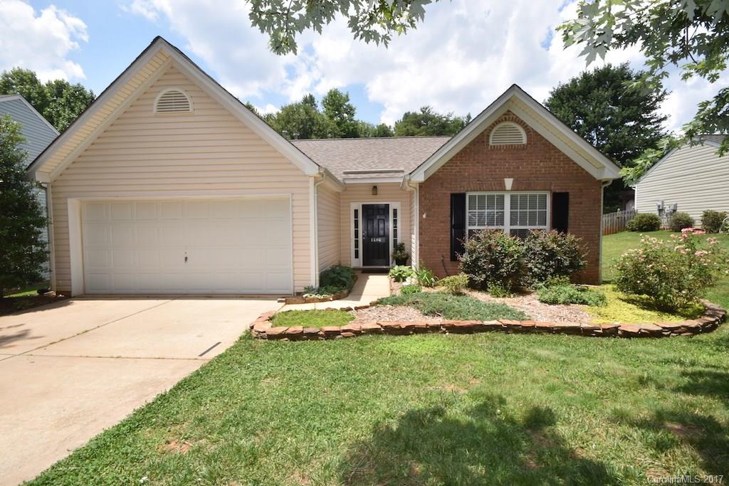 This beautifully updated ranch is move in ready.  With brand new wood flooring, stain master carpet/upgraded pad and freshly painted, there is so much to love about this home. The great room has soaring ceilings and plenty of natural light. Bright neutral colors throughout. Bathrooms are updated with tile floors. The backyard provides privacy with fencing and hardwoods extending past the fence line. Built in garage storage + work bench. Beautiful landscaping surrounds the well maintained home.