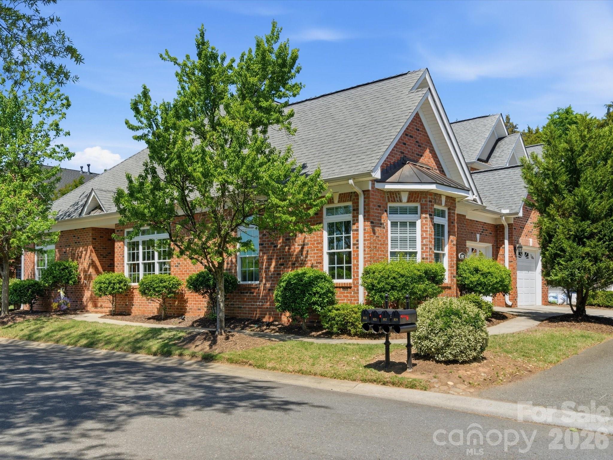 Back on the market at no fault of the home or seller. Buyer’s moving plans changed! 

Rare Waterfront End-Unit Villa in Gated Beacon Knoll Villas!

Enjoy effortless one-level living in this beautifully maintained 3-bedroom, 2-bath end-unit townhome overlooking the lake in Fort Mill's highly sought-after Beacon Knoll Villas. Perfect for those looking to downsize or relocate without sacrificing comfort, this home offers an open, light-filled floor plan that lives much larger than its footprint.
Natural light pours through expansive windows, showcasing picturesque lake views from nearly every room. The spacious great room features hardwood floors, custom built-ins, extensive moldings, and a cozy fireplace, creating an inviting space for both everyday living and entertaining.
The well-appointed kitchen is highlighted by rich **custom** cabinetry, granite countertops, stainless steel appliances, abundant storage, and a functional layout that flows seamlessly into the dining and living areas. A formal dining room with elegant architectural details provides the perfect setting for gatherings with family and friends.  Not one inch of this single-owner home is builder-grade.... everything has been customized for quality, aesthetics and functionality.
The spacious primary suite serves as a private retreat, featuring tray ceilings, beautiful lake views, a large walk-in closet, dual vanities, and a walk-in tiled shower. Two additional bedrooms offer flexibility for guests, hobbies, or a home office.
Step outside to a private brick courtyard patio, ideal for morning coffee or evening relaxation. The end-unit location provides added privacy, additional windows, and exceptional natural light throughout the home. A two-car garage and HOA-maintained exterior make for truly low-maintenance living.
Residents enjoy gated access, a community pool, beautifully maintained grounds, and a prime Fort Mill location just minutes from shopping, dining, healthcare, and charming downtown Fort Mill.