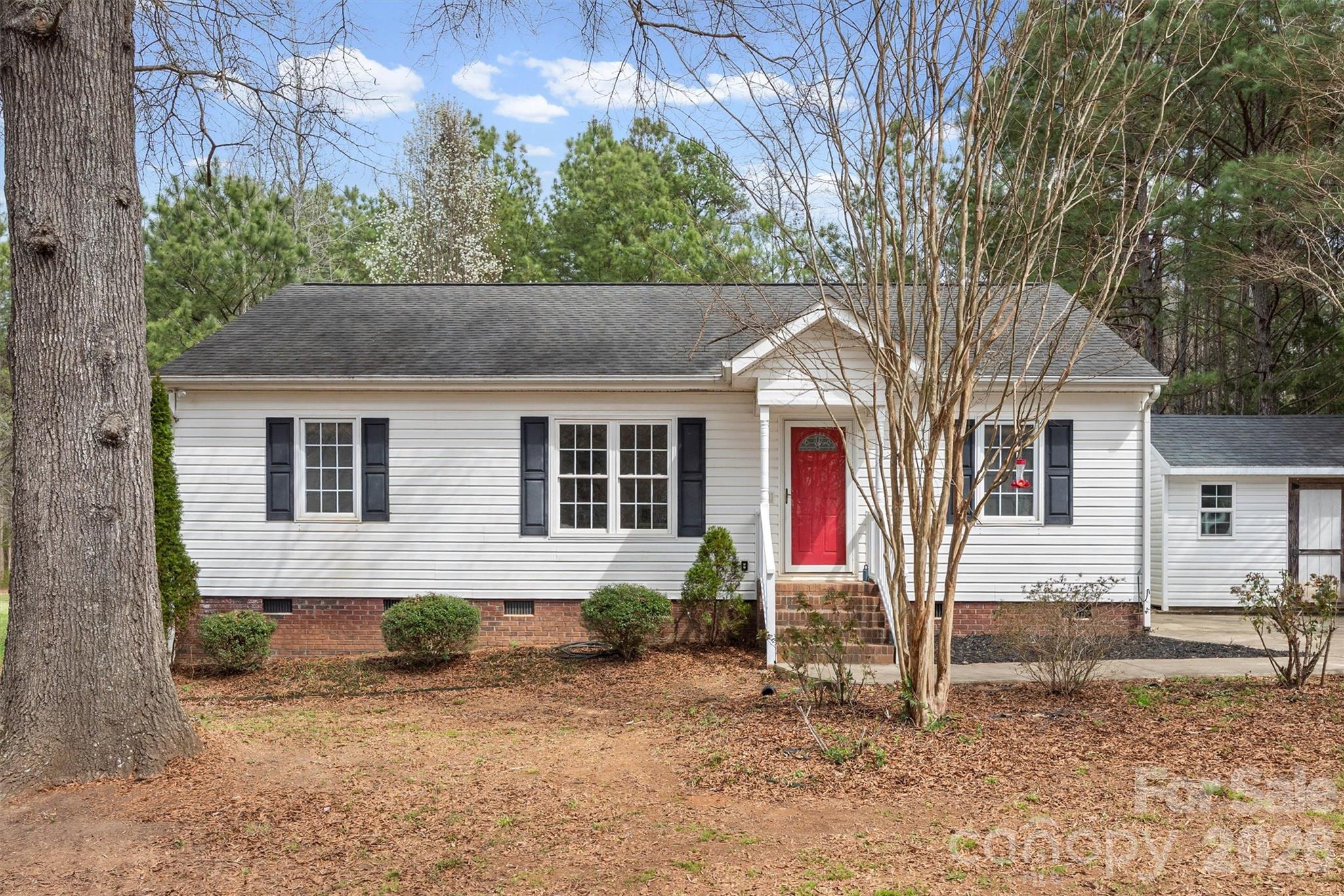 Tucked away on a peaceful wooded property in York, SC, this charming one-level home offers 1,228 square feet of comfortable living with a desirable split-bedroom floor-plan. Built in 2009, the home features 3 bedrooms and 2 full bathrooms, providing both privacy and functionality.

The spacious primary suite is located on one side of the home, while the two secondary bedrooms—featuring brand-new carpet installed in 2026—are situated on the opposite side. The main living areas flow easily for everyday living and entertaining.

Enjoy the beauty and privacy of the surrounding trees, along with the adjoining lots (217 and 215 Nottingham) which are included in the sale, featuring a large open clearing—perfect for outdoor activities, future expansion, or simply enjoying the extra space. Together, the parcels create approximately 2.7+/- acres with plenty of room to spread out.  Recommend that buyer conduct a survey for actual property size.  York County property cards are attached.

Additional updates include a new water heater and new flooring in the primary ensuite, both installed in March 2026. 

If you're looking for single-level living, privacy, and extra land in a convenient York location, this property is a must-see.

Note that 215 Nottingham contains a shed of no value that encroaches onto 217 and 219.  

Washer and dryer do not convey.