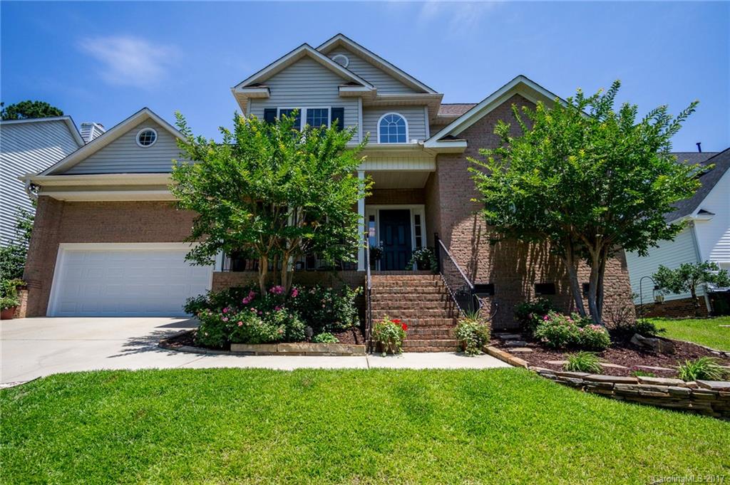 WOW!! Completely Updated home on Tega Cay Peninsula. Beautiful Kitchen and Master Bathrooms. New Bamboo Flooring, Carpeting and New Roof, all in 2016/17.  Entertain in this Large Private Backyard with a Wooded Easement, and Walking path to the Lake. Tega Cay Offers... Golf, Waterfront Parks, Marina, Club House with Restaurant, Tennis and Swimming. Convenient to I77 and Uptown Charlotte. Top Rated Fort Mill Schools and low SC Taxes.