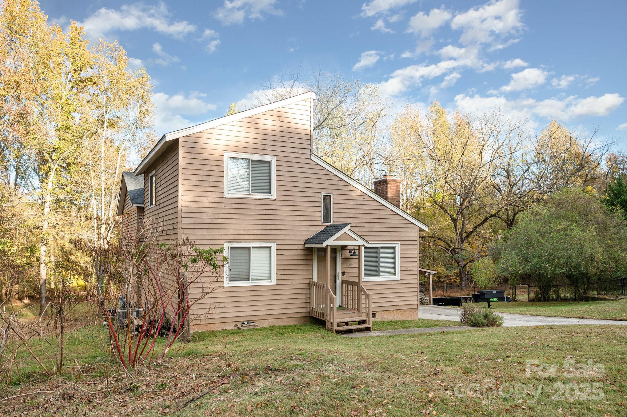 Move-in ready home in the heart of Harrisburg!
This charming 3-bedroom, 2-bath home offers the perfect blend of comfort, style, and convenience. Nestled on over 0.8 acres with mature trees and plenty of space, it provides a peaceful, country feel just minutes from everything Harrisburg has to offer. Enjoy a detached two-car garage with a spacious bonus entertainment room and bathroom upstairs, plus a large carport ideal for extra parking or storage. Additional highlights include expansive outdoor areas and a tranquil setting that backs up to nature with abundant wildlife—perfect for relaxing or entertaining. Don’t miss this hidden gem full of potential!