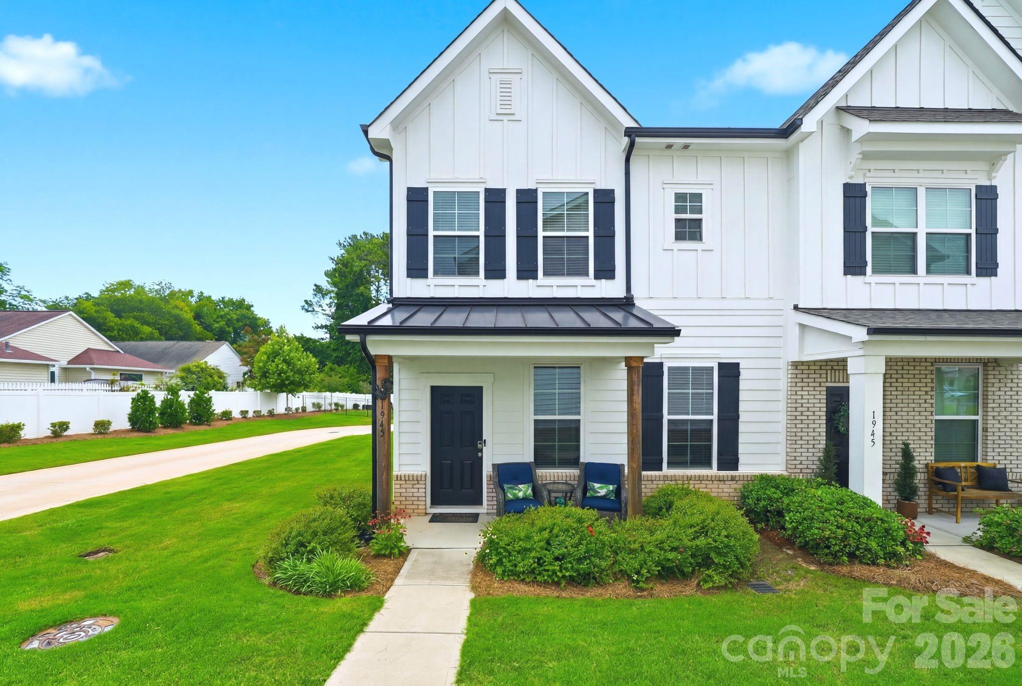 This is the one! Offering true freedom for easy, low-maintenance living that lets you relax when you're home and lock up and go at any time. 
This end-unit townhome is situated as one of the most private homes in the community and backs up to a large fenced green space, perfect for exercising, playing, or letting your pet run freely. It offers a rare combination of privacy and open outdoor enjoyment right outside your door.
Centrally located in Rock Hill, just minutes from downtown Rock Hill and I-77, you’ll have quick access to Charlotte, Fort Mill, shopping, dining, and everyday conveniences, all while enjoying a peaceful residential setting.
The craftsmanship is modern and timeless with upgrades throughout. Step inside to an open floor plan with LVP throughout (upstairs matching and just installed!) featuring a modern kitchen with granite countertops, 5 burner gas cooktop, abundant cabinetry, walk-in pantry, and an LG refrigerator (2023) with craft ice—all included, along with the washer and dryer for added convenience. A stylish half bath and spacious attached two-car garage complete the main level.
Upstairs, you’ll find a spacious hallway leading to three bedrooms, two full bathrooms, and large laundry room. Every bedroom features a ceiling fan and walk-in closet, along with a bright, well-lit layout throughout.
The primary suite stands out with tray ceilings, dual vanities, two walk-in closets, and a large tiled shower with a built-in bench. The secondary bath includes a tub, spacious vanity, and natural light.
This home is thoughtfully designed, beautifully maintained, and truly move-in ready. Owner currently uses transferrable ADT Smart Home Technology. Come see and fall in love!