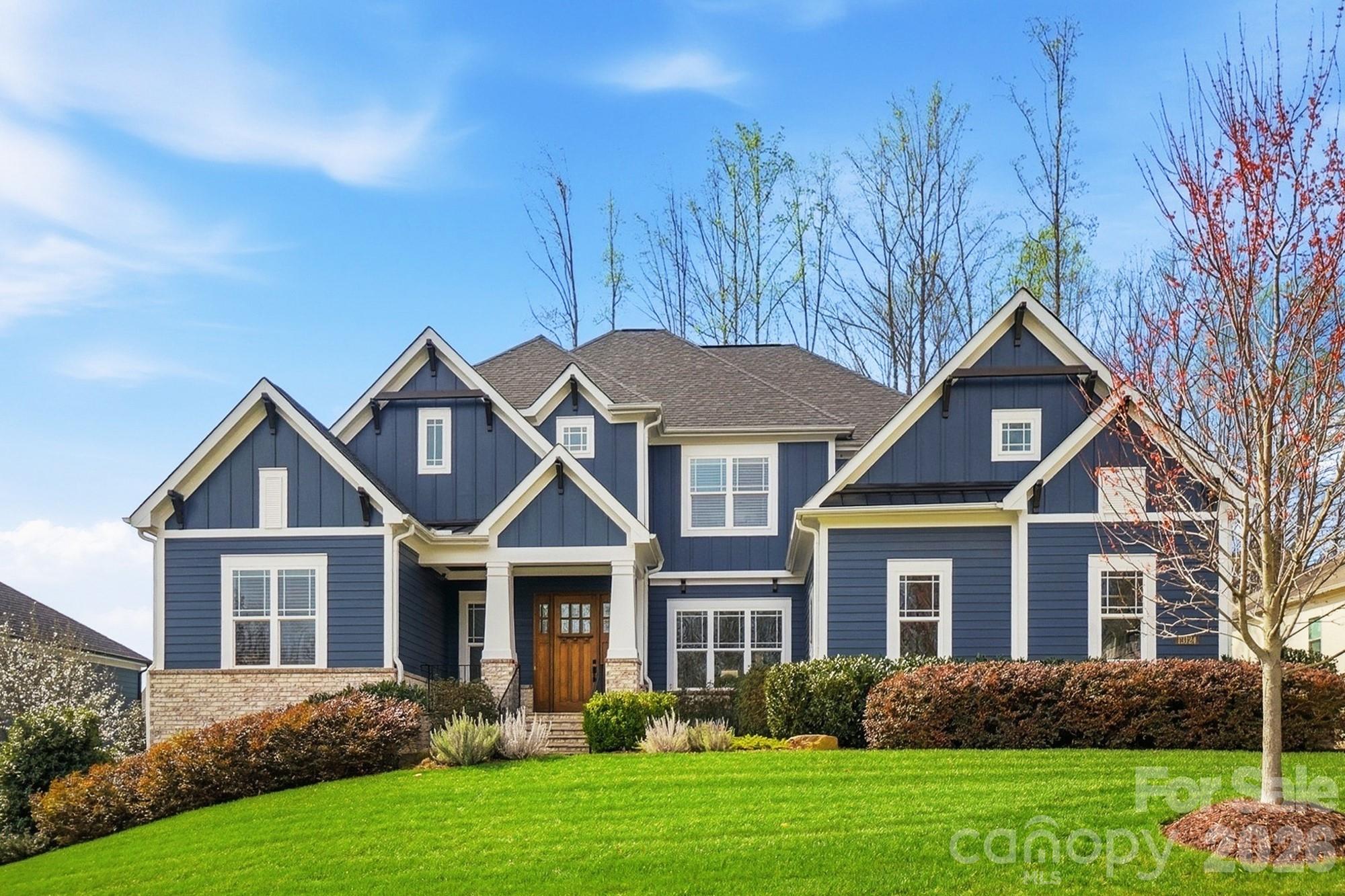 Stunning four-bedroom home with pool in the boutique community of The Woodlands of Davidson. Thoughtfully designed for both elegant entertaining and comfortable everyday living, this home offers beautifully appointed indoor and outdoor spaces perfect for gathering with family and friends.

The chef’s kitchen is a standout feature, showcasing a six burner Wolf gas cooktop, double ovens, built-in microwave, oversized island, abundant counter space, and a hidden walk-in pantry. The kitchen flows seamlessly into the spacious great room, where a gas fireplace, coffered ceiling, detailed woodwork, and fully retractable sliders create a warm and inviting centerpiece of the home. The dining area just off the kitchen provides the perfect setting for everyday family meals, while an additional family room offers a comfortable space to relax and spend time together.

The main level primary suite is a true retreat, featuring separate his-and-hers custom closets, direct access to the outdoor porch and pool, and a spa-inspired bathroom complete with a soaking tub and separate shower. A private home office on the main floor provides the ideal space for remote work, while the formal dining room is perfect for hosting gatherings and celebrations.

Upstairs, you will find three additional bedrooms, three full bathrooms, a large bonus room with a wet bar, and a dedicated exercise room with walk-in storage.

Step outside to your private backyard oasis featuring a pool and hot tub surrounded by travertine decking. The covered porch offers a true outdoor living room with flagstone flooring, a tongue-and-groove wood ceiling with recessed lighting and ceiling fans, a stone fireplace, and television. A covered dining area with direct access to a convenient half bath makes this space ideal for seamless indoor-outdoor entertaining.

A three-car garage completes the home. 

Ideally located with easy access to schools, shopping, and I-77, this exceptional property offers luxury, comfort, and convenience in one of Davidson’s most desirable boutique neighborhoods. Showings begin March 27. This is a home you will not want to miss.