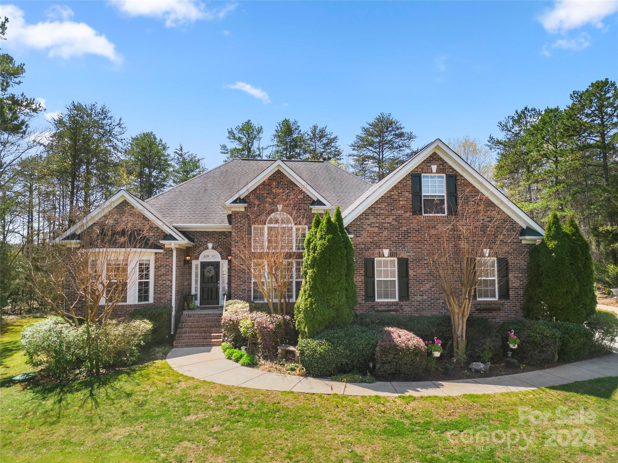 Welcome to peace & tranquility however close to shopping, worship, & only 15 to Ballantyne!  4 Bedroom ranch with bonus/bedroom. Hickory engineered hardwood floors in great room, office, dining room, foyer & primary bedroom. Durable LVP vinyl in kitchen, breakfast & secondary bathrooms. Kitchen boost granite countertops, stainless steel appliances & 6 burner gas Viking range with double ovens. New carpet in bedrooms & entire house freshly painted in neutral colors. Plantation shutters through out most of the house. Office has beautiful built in cabinetry perfect for working at home. Huge screened in porch for entertaining. Wood deck and stone patio. Award winning Fort Mill schools! Easy access off Fort Mill Parkway bypass. 12x16 shed, perfect for storage or workshop.  
Walk out storage in bonus room. Front load washer & dryer remain (only 1 year old). Beautiful & large landscaped yard with 3-zone sprinkler system.