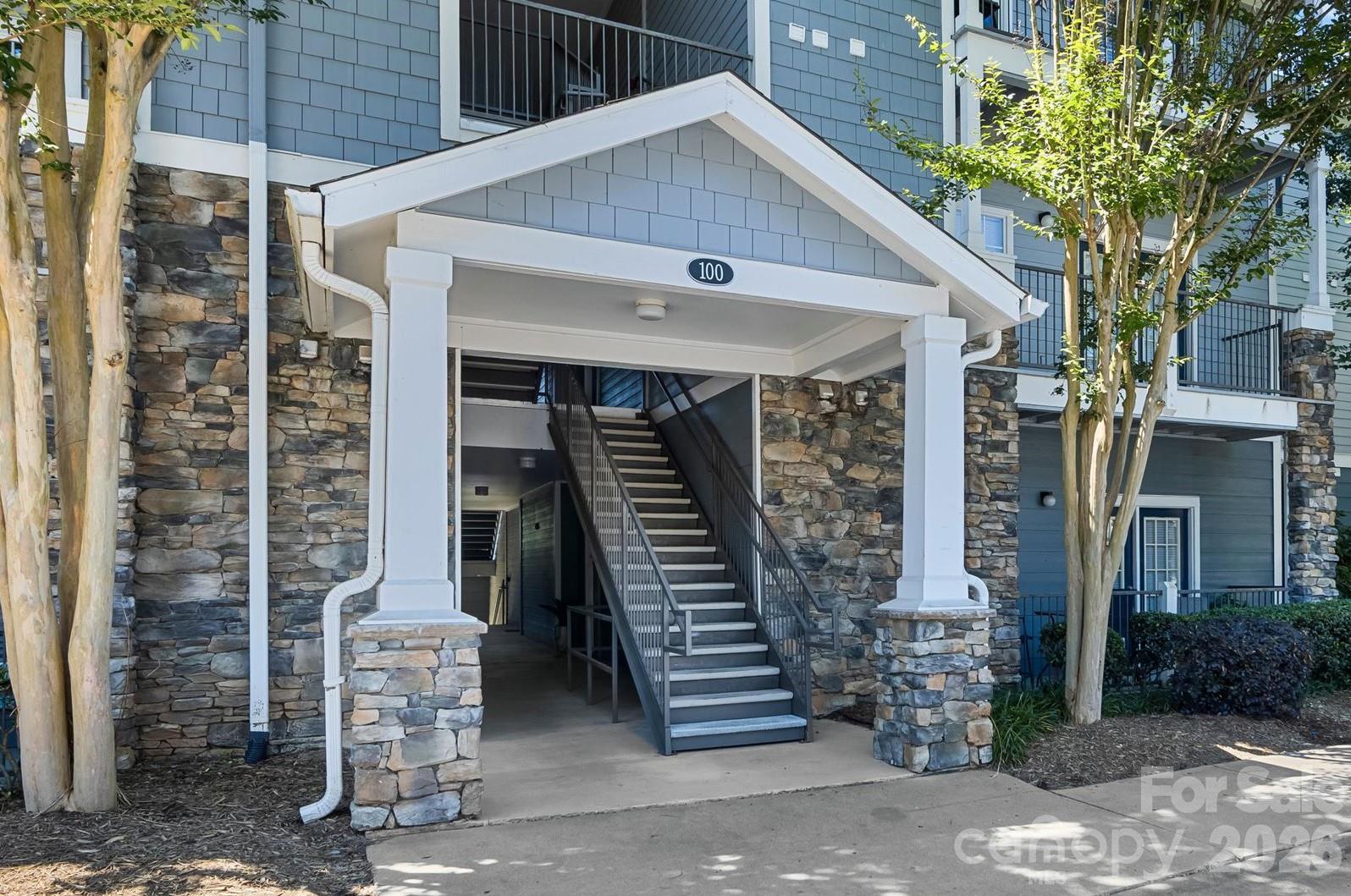 Welcome to this beautiful, well-maintained ground-level 2-bedroom, 2-bathroom condo with functional, open layout in the desirable, established community of The Seasons of Biltmore Lakes Condominiums. This serene unit offers a peaceful balcony for relaxing with morning coffee and conversation. There is a short flight of stairs down to the tucked away and private front door in a covered alcove. 

Inside, you will find all new, elegant, and easy-maintenance vinyl plank flooring and high ceilings throughout. The kitchen includes a brand-new dishwasher, pantry closet and breakfast bar, a laundry room with new Samsung washer and dryer. The open concept kitchen, dining and living areas enjoy natural light from the French doors that lead out to the covered balcony. Enjoy the privacy of a split bedroom floor-plan including a spacious primary suite with walk-in closet and ensuite full bathroom and an additional bedroom with walk in closet and full guest bathroom.  

You will love the community amenities such as a fitness center, outdoor swimming pool, clubhouse, playground, dog park, lovely walking trails, plentiful parking and more. Conveniently located 10 minutes drive to West Asheville, 15 minutes to downtown Asheville or to Pisgah View State park (slated to reopen in late 2026!) and the Blue Ridge Parkway, with abundant dining, shopping and walking trails all around.

This convenient condo would make an excellent primary residence, second home, or investment opportunity, perfect for a first time buyer or one who is down-sizing. Come check out all that this lovely unit and community have to offer!