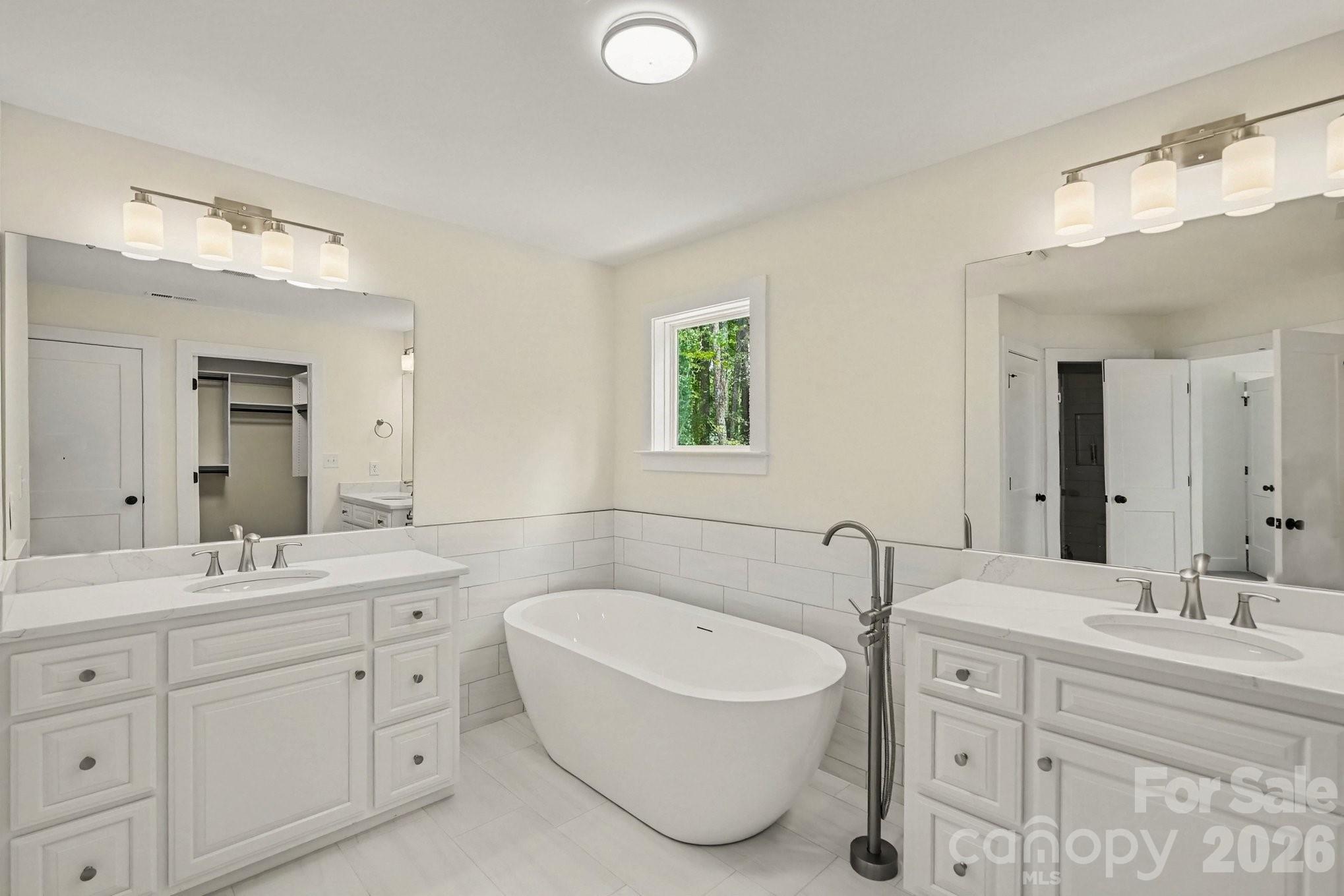 Experience the perfect balance of small-town charm and modern luxury in this exceptional 4-bedroom, 3.5-bath residence nestled in the heart of Locust, North Carolina. Offering more than 2,773 square feet of thoughtfully designed living space, this home lives much larger than its footprint and delivers an impressive level of comfort and sophistication. The versatile main-level office with elegant double doors is the ideal private home office, formal living room, or executive study. The beautifully appointed kitchen is designed for both entertaining and everyday living, featuring custom cabinetry, stainless steel appliances, a center island, and an oversized walk-in pantry perfect for storing all the extra cookware and foods for your next feast.

Upstairs, convenience meets function with a centrally located laundry room and four spacious bedrooms. The luxurious primary suite is a true retreat with tray ceiling, customized walk-in closet, and a spa-inspired bath complete with a soaking vessel tub, custom tiled shower, dual vanities, and a private water closet. Generously sized secondary bedrooms offer exceptional closet space, and one bedroom enjoys the privacy of its own en-suite bath—perfect for guests or multigenerational living. All full bathrooms feature upgraded custom vanity countertops. Outside, you'll appreciate the expanded driveway leading to the oversized two-car garage. You can create the ultimate backyard on your half acre of paradise. Rear border of the lot is still wooded for guaranteed privacy. But what truly sets this home apart is the lifestyle that comes with it. Low HOA fee of $399 annually gives you access to a community pool all summer long. Only a short ride to all that Locust has to offer. Shops, stores and restaurants - local festivals and RedBridge Golf Course too! All this and a builder warranty too. You'll be the first owner of this beauty and love coming home every day!