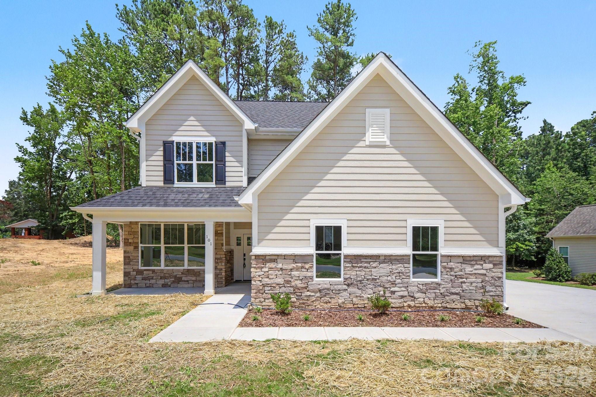 Experience the perfect balance of small-town charm and modern luxury in this exceptional 4-bedroom, 3.5-bath residence nestled in the heart of Locust, North Carolina. Offering more than 2,773 square feet of thoughtfully designed living space, this home lives much larger than its footprint and delivers an impressive level of comfort and sophistication. The versatile main-level office with elegant double doors is the ideal private home office, formal living room, or executive study. The beautifully appointed kitchen is designed for both entertaining and everyday living, featuring custom cabinetry, stainless steel appliances, a center island, and an oversized walk-in pantry perfect for storing all the extra cookware and foods for your next feast.

Upstairs, convenience meets function with a centrally located laundry room and four spacious bedrooms. The luxurious primary suite is a true retreat with tray ceiling, customized walk-in closet, and a spa-inspired bath complete with a soaking vessel tub, custom tiled shower, dual vanities, and a private water closet. Generously sized secondary bedrooms offer exceptional closet space, and one bedroom enjoys the privacy of its own en-suite bath—perfect for guests or multigenerational living. All full bathrooms feature upgraded custom vanity countertops. Outside, you'll appreciate the expanded driveway leading to the oversized two-car garage. You can create the ultimate backyard on your half acre of paradise. Rear border of the lot is still wooded for guaranteed privacy. But what truly sets this home apart is the lifestyle that comes with it. Low HOA fee of $399 annually gives you access to a community pool all summer long. Only a short ride to all that Locust has to offer. Shops, stores and restaurants - local festivals and RedBridge Golf Course too! All this and a builder warranty too. You'll be the first owner of this beauty and love coming home every day!