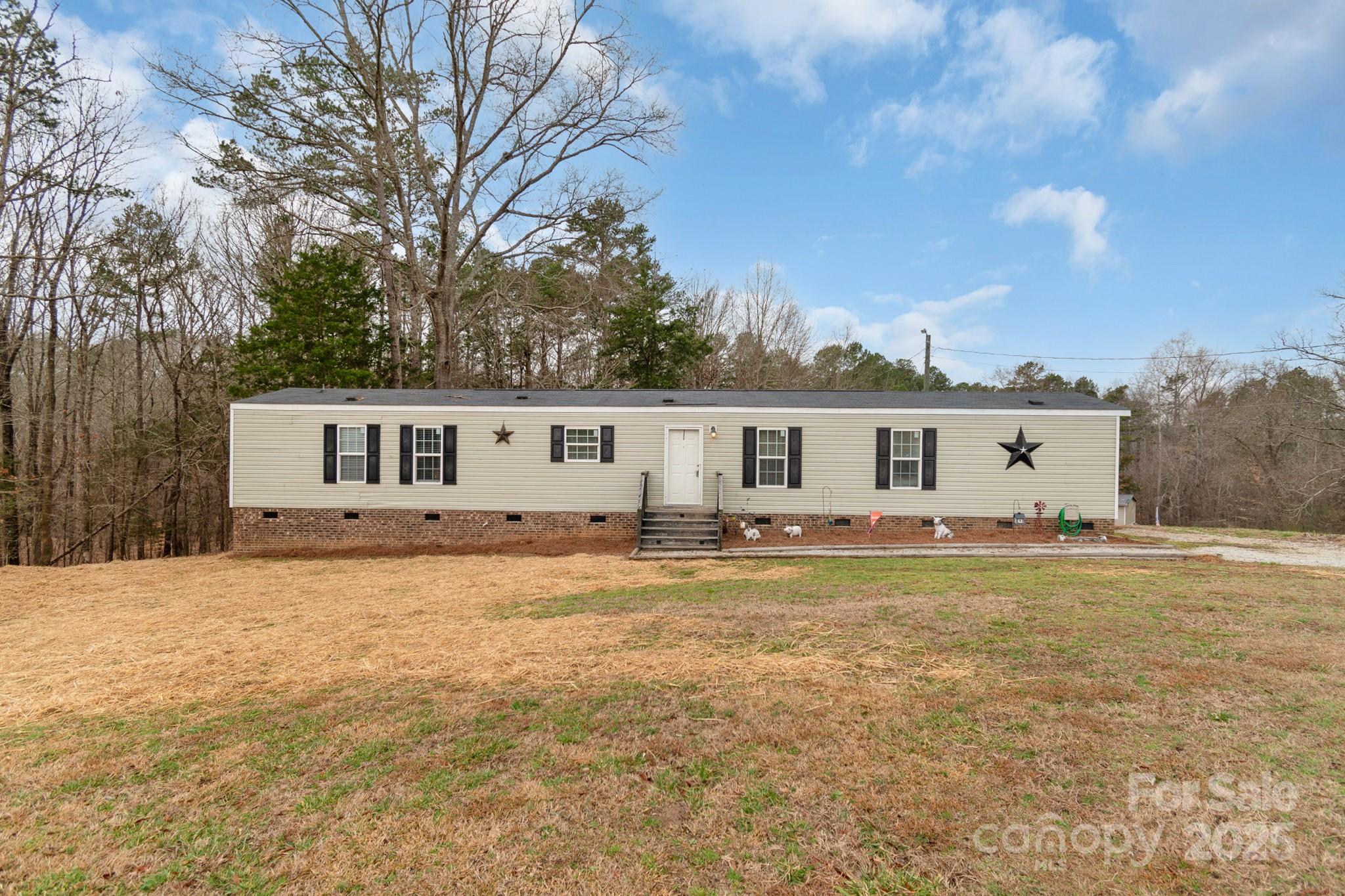 Escape the hustle and bustle with this beautiful 3-bedroom, 2-bath home nestled on 3.72 serene acres. Located on a quiet dead-end road, this property offers privacy and tranquility while still being a short drive from town. Enjoy spacious living and plenty of room for outdoor activities. A perfect retreat for those seeking comfort and seclusion!