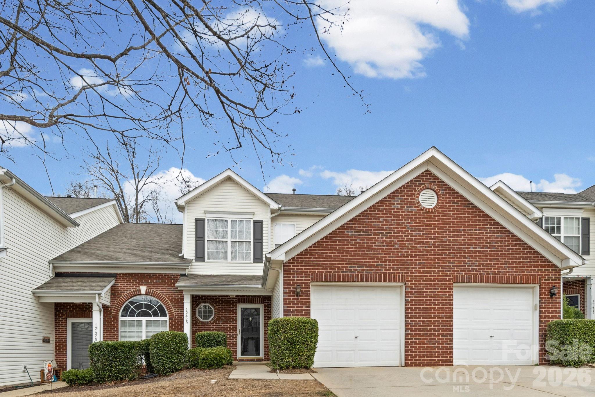 Comfortable Living Just Minutes from Carolina Place Mall Welcome to 12429 Stratfield Pl Cir in Pineville, NC! New Quartz countertops, freshly painted, new SS appliances, new carpet and new LVP flooring! A thoughtfully designed townhome offering comfort, functionality, and a convenient location close to everything you need. Inside, the main level features a spacious living room that flows seamlessly into the dining area and open kitchen, creating a welcoming space for everyday living and entertaining. The kitchen offers generous counter space, white cabinetry, and an open layout that keeps you connected to guests and family while preparing meals. A cozy fireplace anchors the living space, adding warmth and character. Upstairs, you’ll find two well-sized bedrooms including a primary bedroom with its own walk-in closet and private bathroom. A second full bathroom serves the additional bedroom, while the upstairs laundry area provides convenient access right where you need it most. Step outside through the sliding doors to a private patio area—perfect for enjoying morning coffee or relaxing outdoors. The attached garage adds additional storage and everyday convenience. Located just minutes from Carolina Place Mall, shopping centers, restaurants, and nearby parks, this home offers easy access to entertainment, dining, and daily essentials. If you’ve been looking for a well-located home with comfortable living spaces and practical design, this Pineville property is it!