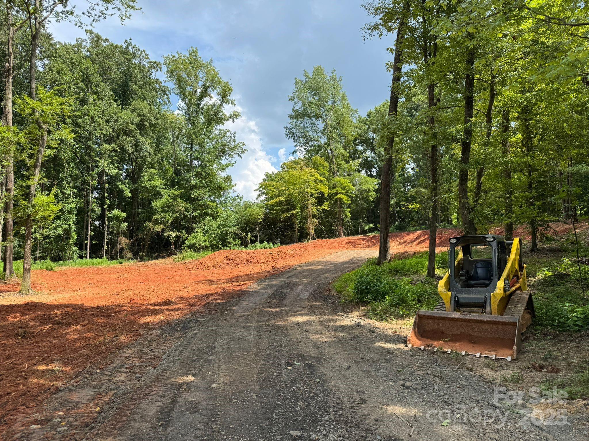 Ready-to-Build Lot Just Minutes from Charming Downtown Waxhaw! This peaceful and spacious 1.34-acre lot offers the ideal blend of nature and convenience, located just minutes from historic downtown Waxhaw — a vibrant area known for its small-town charm, boutique shops, local restaurants, and lively community events. Site Prep Completed — Start Building Immediately! Trees cleared Preped house area for a 70'x60' home Driveway ready Well water is s ready Septic area approved for a 4 bedroom house Prime Location Highlights: Short drive to Harris Teeter, ALDI, Walmart, and Cureton Town Center Convenient access to Western Union Elementary and Parkwood Schools Just minutes from all the amenities and charm of downtown Waxhaw. All the major site work has already been completed — saving you time, money, and stress. Don’t miss this rare opportunity to build your dream home in one of Union County’s most desirable areas. Avera Custom Homes will guide you thru the process of designing and building exactly what suits your needs. Land is hard to find, and land like THIS is even harder. Dont miss out!