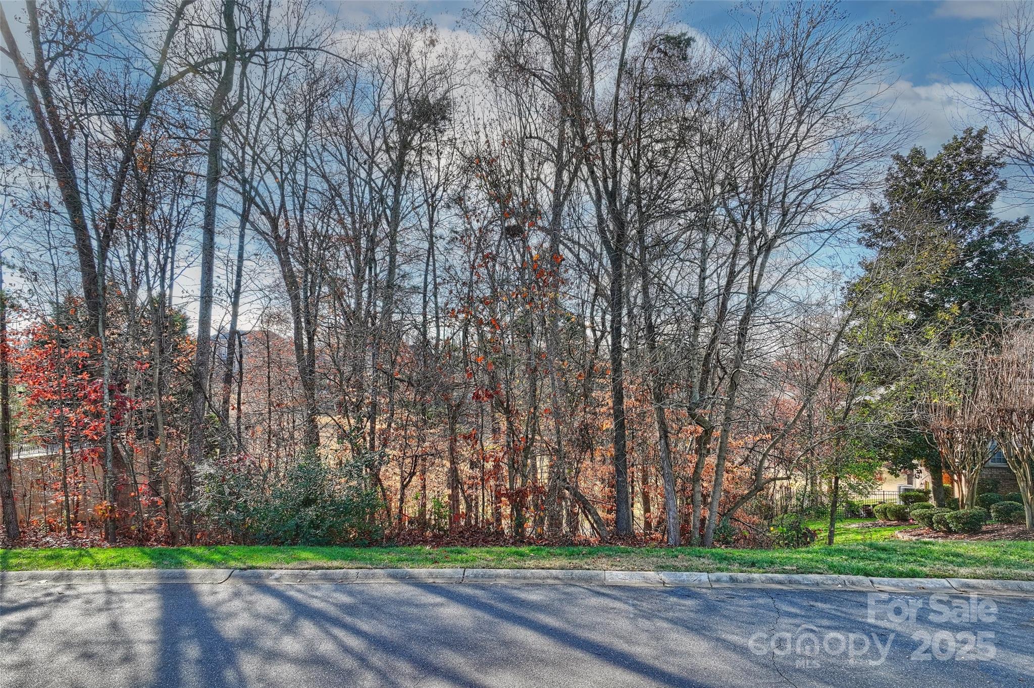 One of the last premium golf course view home sites available in the prestigious Ballantyne Country Club! This rare .47-acre cul-de-sac lot offers an exceptional opportunity to custom-build your dream home in one of Charlotte’s most sought-after luxury communities. Enjoy serene views of the rolling fairways and privacy while being just steps from world-class club amenities. Ballantyne Country Club is known for its championship golf, expansive practice facilities, tennis, swimming, fitness, social activities, and dining; all set within a beautifully maintained private environment. Membership is required to use the club's amenities. For details on membership and club packages, contact Ballantyne Country Club Membership Services at 704-544-1404. Conveniently located in South Charlotte, the Ballantyne area offers an exceptional lifestyle with easy access to premier shopping, dining, and entertainment, including Ballantyne Bowl and Village, Stonecrest Shopping Center, and The Pavilion. Residents enjoy top-rated schools, major employment centers, medical facilities, and quick access to I-485 and I-77, making this not just a home site, but a lifestyle destination. Don’t miss this rare chance to build in one of Charlotte’s most desirable golf course communities!