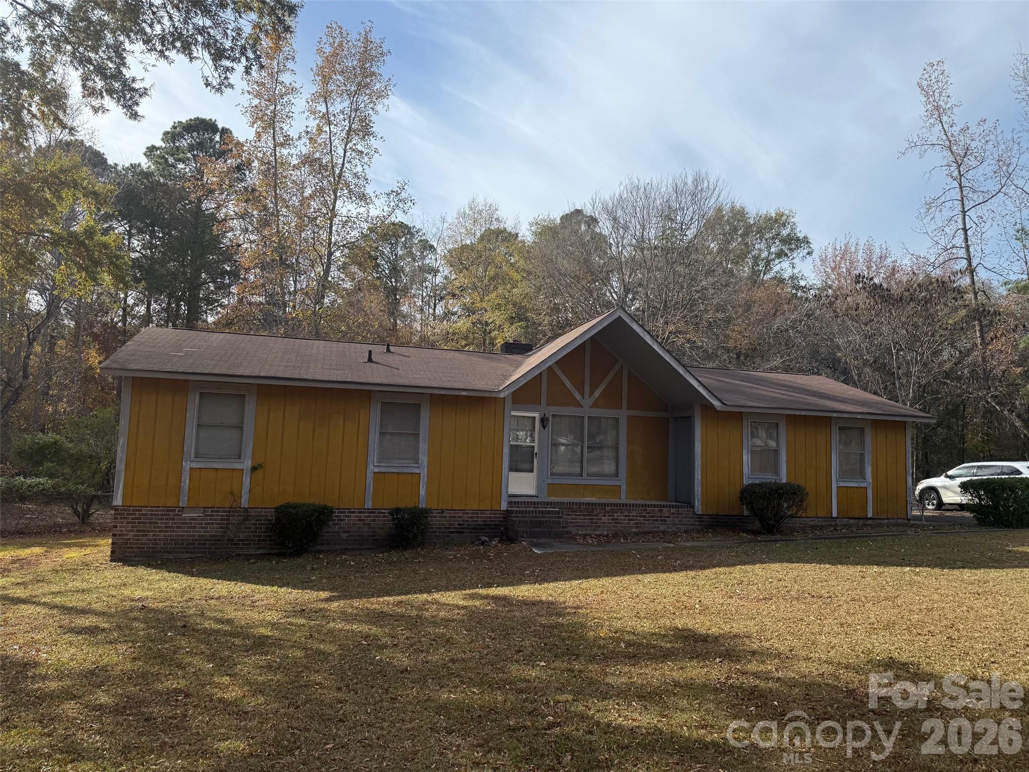 This home needs lots of love and care. It's on the market 'AS IS' but it's in an excellent neighborhood, & the yard/grounds are exceptional!  It's a 3-bedroom, 2-bath home with a nice, spacious living room/den that opens directly into the country kitchen.  A deck on the back looks over a beautiful backyard w/ shade trees. It's truly a magnificent property.  Call for an appointment to view.  INSIDE PICS COMING!