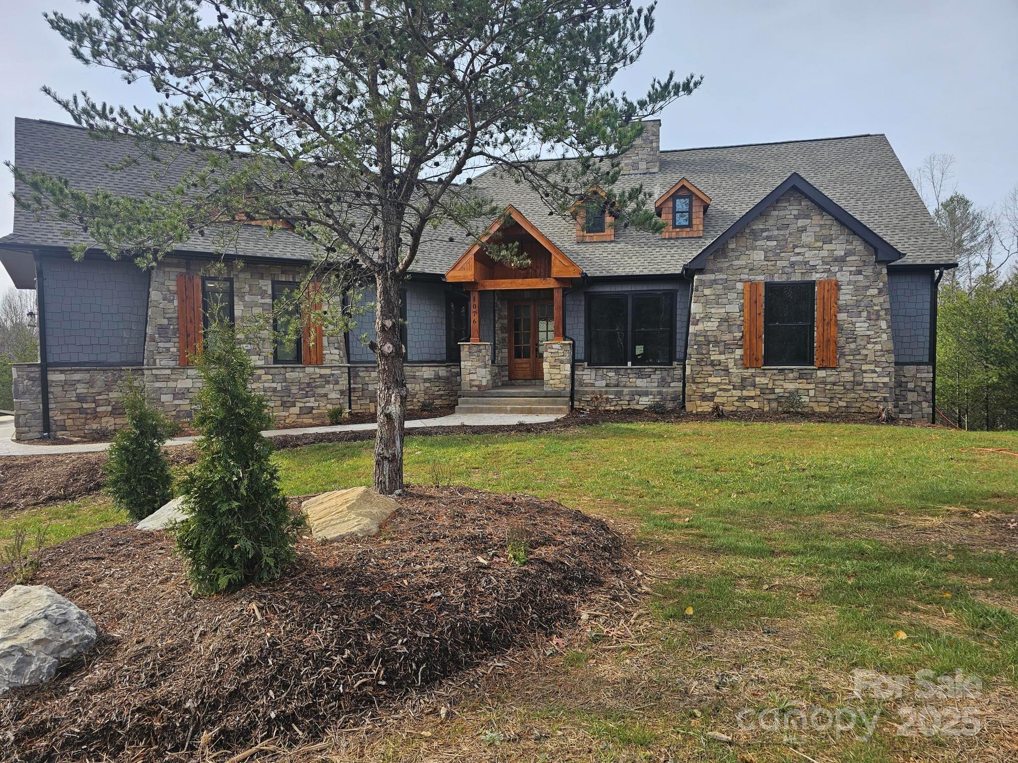 Beautiful Craftsmen/European home on 2.75 acres in a gated community. Property is located in the foothills of the blue ridge mountains. Lot is large with a cleared area in the back for a future shop including a second driveway for access. Ideal for a pool in the back yard.  Over 5000 sqft of home with oversized windows and a lot of glass to allow for nature and natural light. 15 minutes from downtown shopping, hospitals and restaurants.