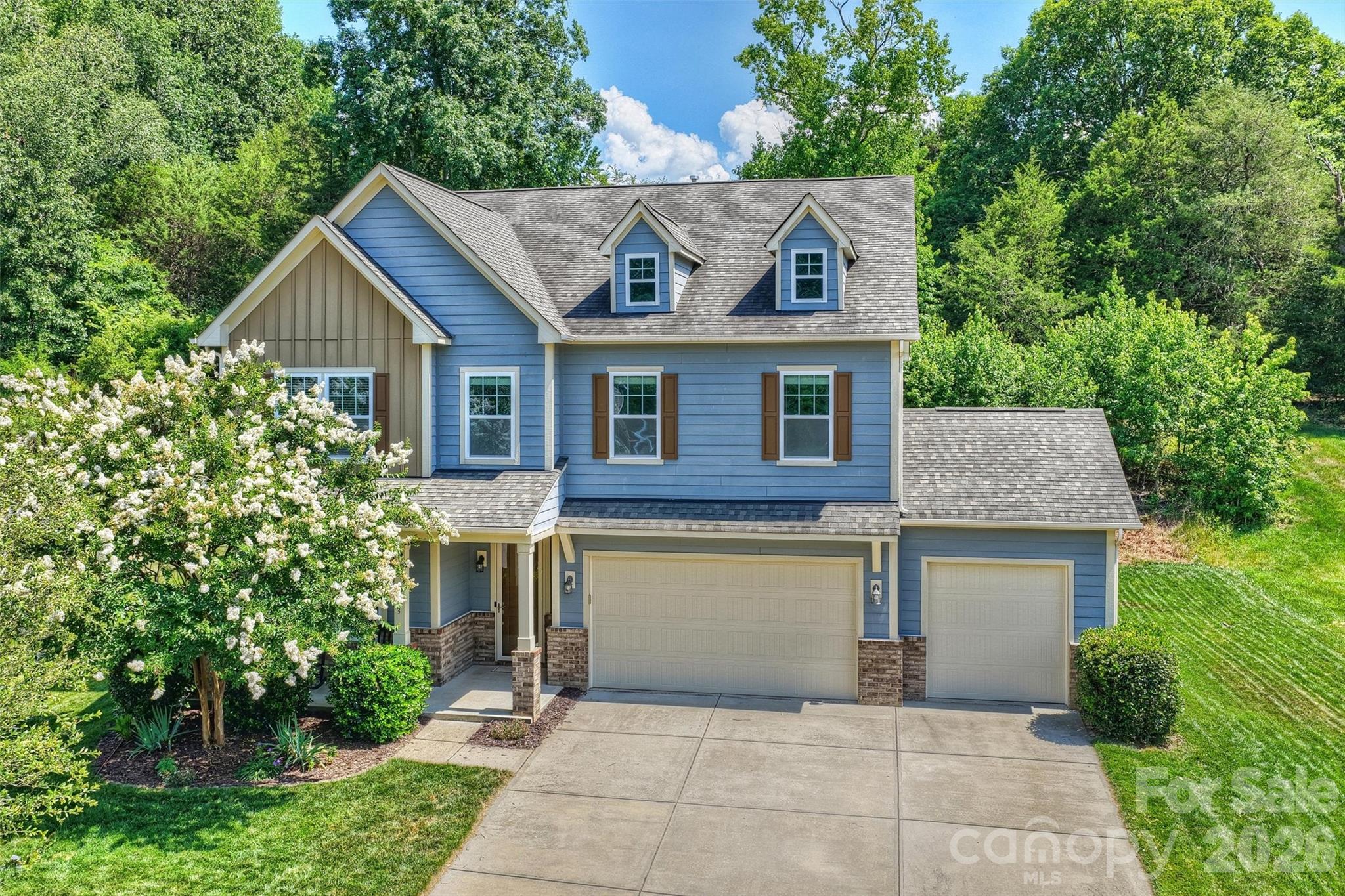 Welcome to Fox Ridge - one of Indian Land's most sought-after communities, where Lancaster County SC property taxes meet Charlotte-adjacent convenience. Buyers working in Ballantyne or South Charlotte will appreciate the easy commute, with restaurants, retail, and everyday essentials just minutes away.
Inside, 10-ft ceilings and an open-concept layout give this immaculate home an effortlessly spacious feel. Hardwood floors flow throughout the main level, connecting a flexible main-floor office - easily used as a bedroom - to the showstopping gourmet kitchen. Featuring a 36" gas cooktop, double wall ovens, granite countertops, tile backsplash, oversized island, and walk-in pantry, this kitchen was made for both everyday living and easy entertaining.
Upstairs, the primary suite is a true retreat with French doors leading to a private sitting room or office, a walk-in closet, and an en suite bath. Three additional bedrooms and a versatile loft - perfect as a second living area or play space - offer room for everyone to spread out. Second-floor laundry, a tankless gas water heater, and a 3-car attached garage round out the practical extras. Out back, a new pavered patio sets the stage for relaxed outdoor living in a low-maintenance yard. Invsible fence included!