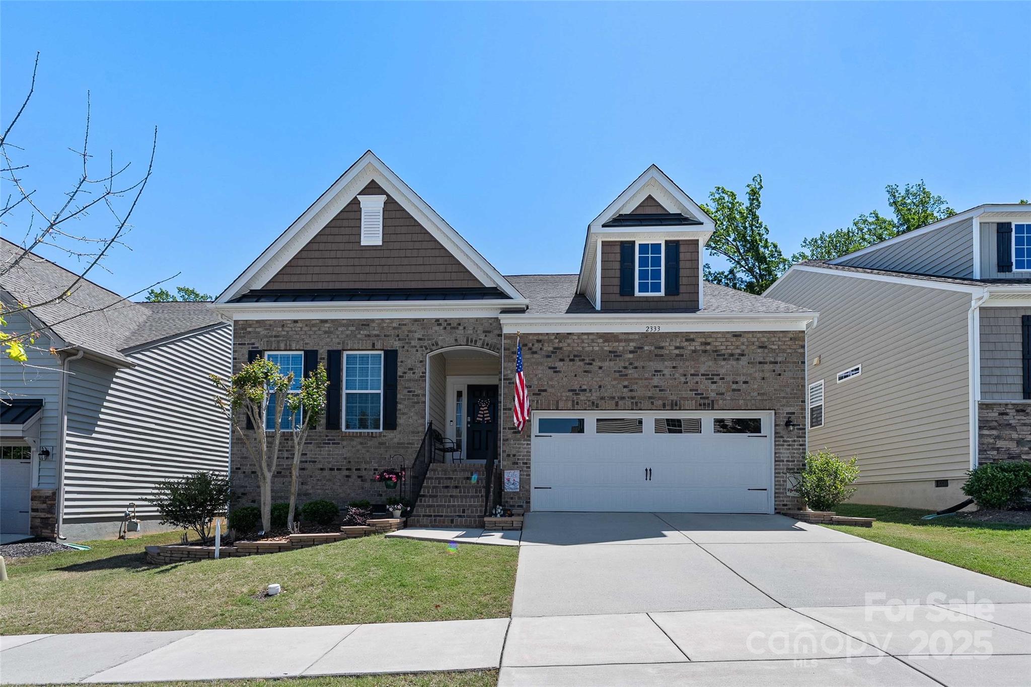 Meticulously maintained home in desirable Waterside at the Catawba neighborhood. Sought out Dorchester Model w/extended family room, fireplace and fresh neutral paint throughout (2024). Open concept main floor living w/new Board & Batten and feature walls in main floor bedrooms (2024). Lovely well maintained hardwood flooring on main level. Kitchen features granite countertops and SS appliances, w/new microwave. Upgraded light fixtures in main living. Large owner’s suite with retreat and private access to freshly stained screen porch w/wooded nature views. Large garden tub and separate walk-in shower in Owner’s bath. Abundance of storage including 2nd floor walk-in attic and built-in garage shelving. 2nd floor offers a large loft, full bath, and bedroom w/walk-in closet. Located on quiet street. Resort style neighborhood amenities including resident led events. Located in one of SC top school districts. Harris Teeter coming soon (Fort Mill Pkwy). Target & Costco coming soon (Hwy 521).
