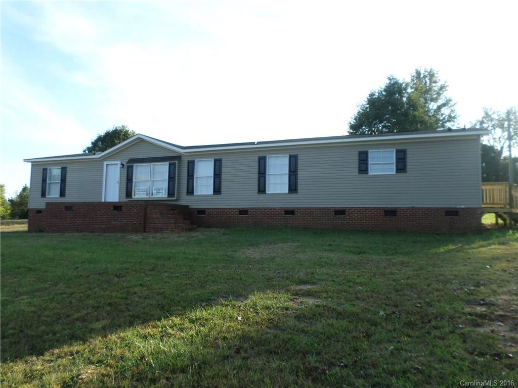 This is a great land and home.  It is move in ready, with lots of room inside and outside.  The owner is willing to take an application to owner finance.