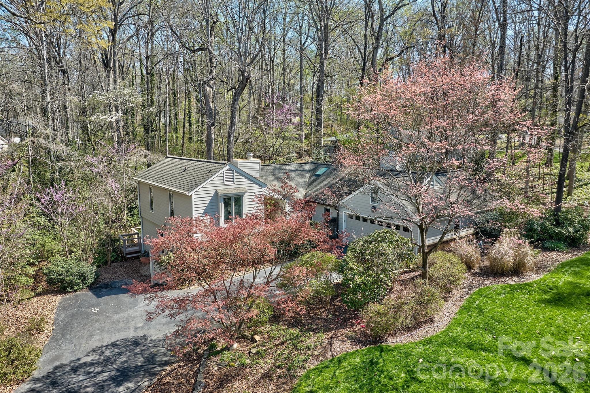 Price Adjustment in time for summer at the lake!!
Welcome to this cozy home with amazing outdoor living options!  Massive rear deck that feels like you are in treehouse!  Wrap around screened porch!  Very private backyard and setting.  Oversized garage with workroom and 1 side extra long parking spot.  Great location on 1 of the more desirable streets of Fairway Ridge inside gated waterfront community of River Hills.  Fairway Ridge is big circle street so awesome for riding bikes for the kids or walking the dog.  This house welcomes you in with several living areas, 2 fireplaces, nice flow from kitchen to den and porch and split bedroom plan.  Primary suite is set off by itself and has access to the huge deck.   Very well maintained home and pride of ownership is evident.   3 full bathrooms to accommodate all your folks!  River Hills offers miles of walking trails, country club with 18 hole golf course, 2 pools, tennis and pickleball, marina with 150 slips, playgrounds, dog park, gardens and waterfront park with a sandy beach!  Who could ask for more!!  Oh and did I mention it's  a gated community with 24 hour security ?  Welcome home!!