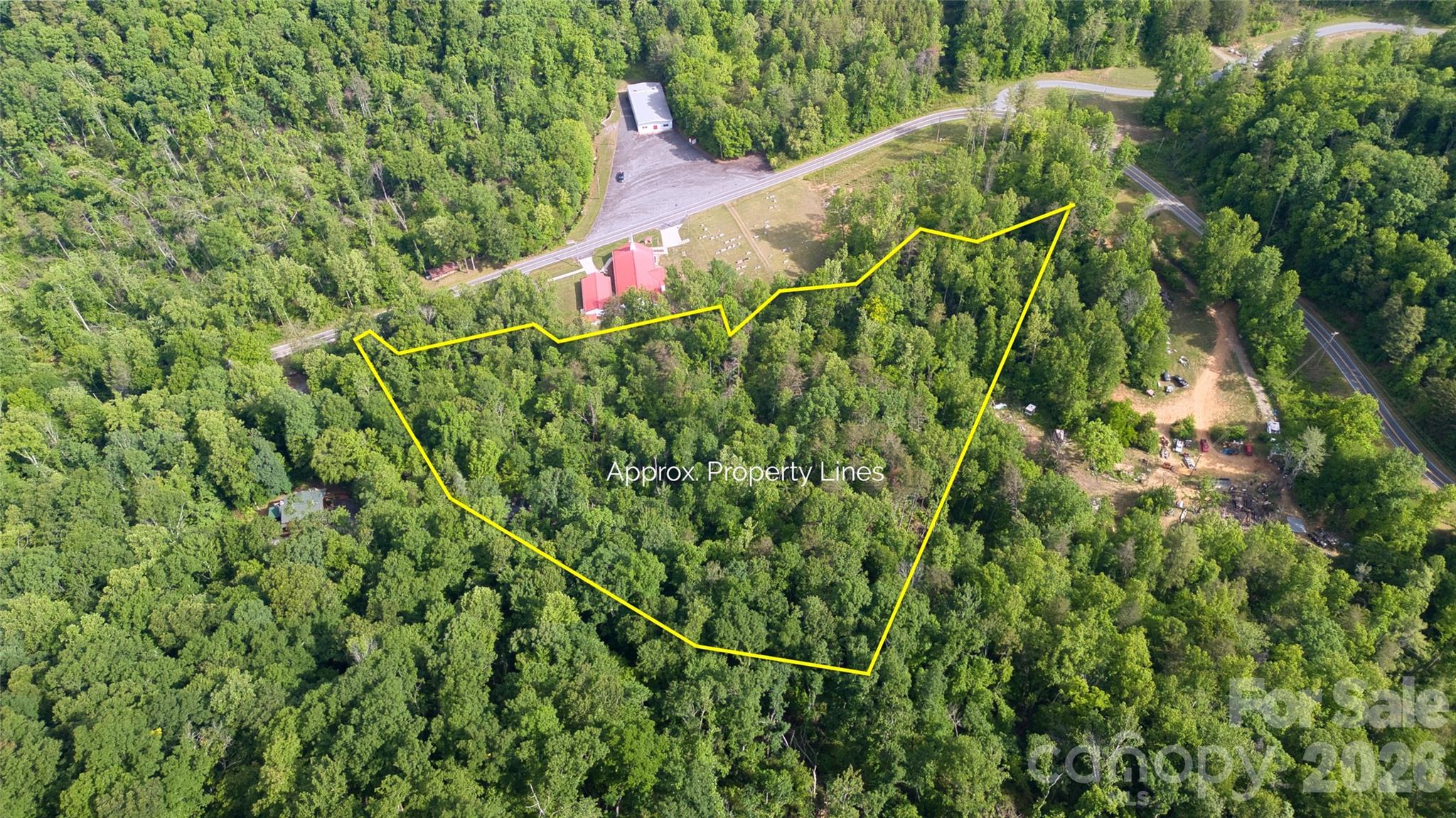 This property already has key improvements in place, including a driveway leading to a cleared and flattened building site with a 12x16 pavilion, plus a natural stream that could potentially be enhanced into a pond. Located within a small mountain development featuring seven existing cabins, this lot is one of only two remaining undeveloped parcels, offering gravel/dirt road access maintained by the HOA. Power is available for connection, a shared community well serves the neighborhood, and a septic system will be required, with neighboring systems already functioning without issue. The property sits within the Shock Creek HOA, which is informally managed and primarily focused on road and well maintenance, with minimal oversight and occasional gravel contributions. Seller financing available!