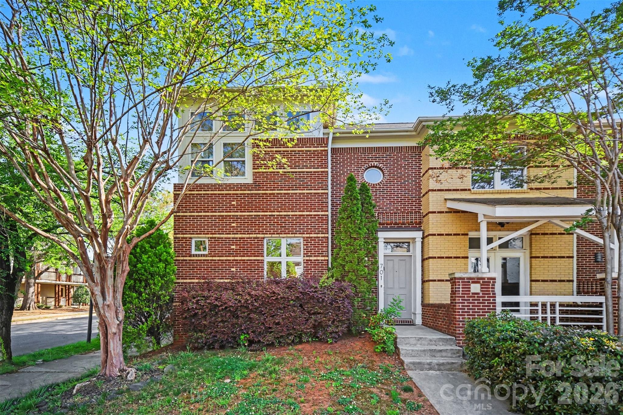 Welcome to 701 E 8th St - Exceptional INVESTMENT opportunity in the heart of First Ward. This END-UNIT townhome is being sold FULLY FURNISHED, making it truly turnkey. Ideally located in Uptown Charlotte, just steps from top dining, parks, nightlife, and premier sports and entertainment venues including Panthers Stadium, Knights Stadium and Blumenthal Performing Arts. This property is currently a successful Airbnb!  Featuring 3BRs and 2.5 BAs. This light-filled home features an open-concept layout with abundant natural light, enhanced by its desirable end-unit position. Designed for both entertaining and everyday living, the space offers a stylish European flair, gas fireplace, and seamless flow between living, dining, and kitchen areas. 9-foot ceilings on the main level creates an airy, spacious feel. Dramatic triple window/door with sidelights and arched transoms in the dining area.  Functional kitchen with breakfast bar. Enjoy private outdoor spaces including an enclosed courtyard and semi-private side porch with direct home access.  The second-floor primary suite is a standout, boasting soaring ceilings, exceptional natural light, and great skyline views of Uptown Charlotte within the First Ward community. Spacious walk-in closet and updated bath with walk-in shower.
Whether hosting friends for game day, enjoying a night out at the symphony or ballet, or simply taking in the city views, this home offers the ultimate Uptown lifestyle. Ideal for investors, second-home buyers, or those seeking a fully furnished move-in-ready property.
