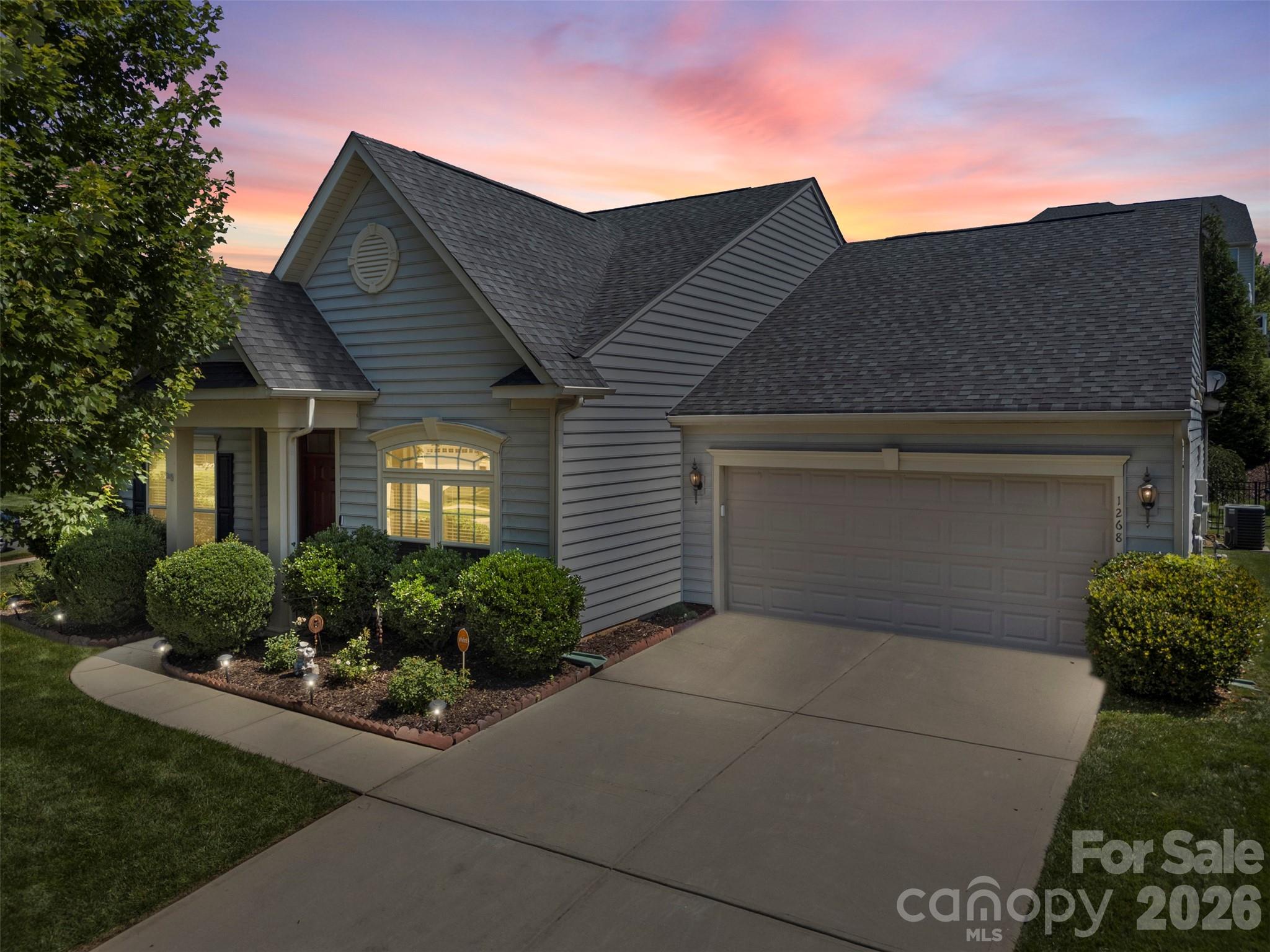 Welcome to this beautifully maintained 4-bedroom, 3-bath home located in the highly desirable Rosemont community of Indian Land! Ideally situated just minutes from Ballantyne, you'll enjoy convenient access to shopping, dining, entertainment, and everyday amenities while benefiting from low South Carolina taxes.

This thoughtfully designed floor plan features 3 bedrooms on the main level, including the primary suite, with a private upstairs bedroom and full bath that is perfect for guests, a home office, bonus room, or multi-generational living.

Pride of ownership is evident throughout, with meticulous maintenance and attention to detail. Outside, you'll find a stunning custom waterfall feature that creates a peaceful backyard retreat, perfect for relaxing or entertaining. Situated on a desirable corner lot, the property offers added space, curb appeal, and privacy.

Residents of Rosemont enjoy resort-style amenities, scenic sidewalks, community events, and a prime location near the North Carolina border. This is a rare opportunity to own a move-in-ready home in one of Indian Land's most sought-after neighborhoods.