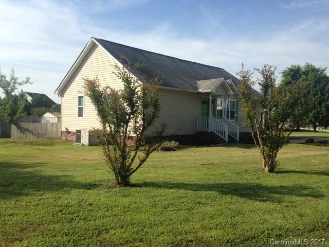 Extra large lot with storage building and fenced yard; washer & dryer inlcuded