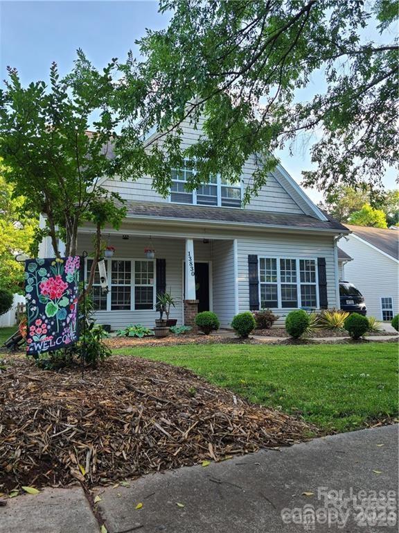 Charming 2-story home in a prime location! Features durable laminate wood flooring throughout and a brand-new kitchen complete with new appliances. Spacious primary suite is located on the main level and offers a stand-up shower, jacuzzi tub, and dual vanity sinks. Oversized laundry room provides convenient access to the fenced backyard, perfect for entertaining around the firepit. Enjoy privacy and wooded surroundings ideal for relaxation. Conveniently located just minutes from Lake Norman, Birkdale Village, I-77, shopping, dining, and more.