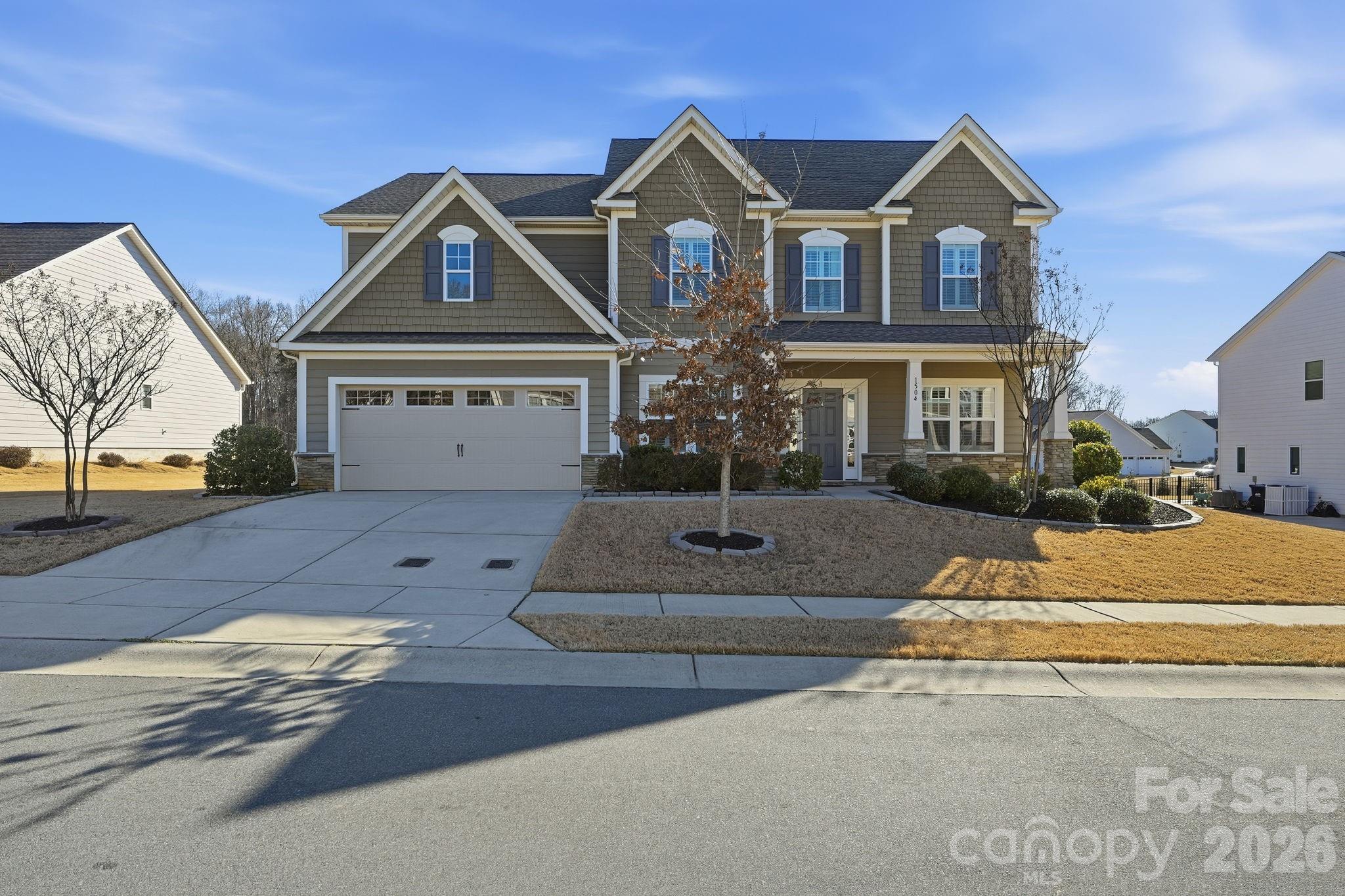 Welcome to this impeccably maintained home perfectly blending comfort, function, and lifestyle. The inviting front porch sets the tone for what awaits inside. Step into a bright, open-concept floor plan thoughtfully designed for modern living and effortless entertaining. At the heart of the home is a stunning kitchen featuring an oversized granite island, ideal for gatherings, casual meals, or morning coffee. A large walk-in pantry offers exceptional storage, making organized, clutter-free living easy. The rear of the home is lined with abundant windows that flood the main living areas with natural light, creating a warm and welcoming atmosphere. All four bedrooms feature their own walk-in closets, providing generous storage for everyone. The spacious primary suite serves as a true retreat, complete with a private sitting room and two walk-in closets, one so expansive it rivals a dressing room. The bonus room offers flexible space for a media room, playroom, or secondary living area. Laundry is conveniently located upstairs alongside the bedrooms, no more carrying heavy loads up and down the stairs. For added flexibility, an additional washer and dryer hookup is available on the main level. Working from home is effortless with two dedicated office spaces, the primary office adorned with beautiful French doors for privacy and style. With thoughtful upgrades, incredible storage, and access to the community pool and amenities, this home represents an exceptional opportunity in the Waxhaw market.