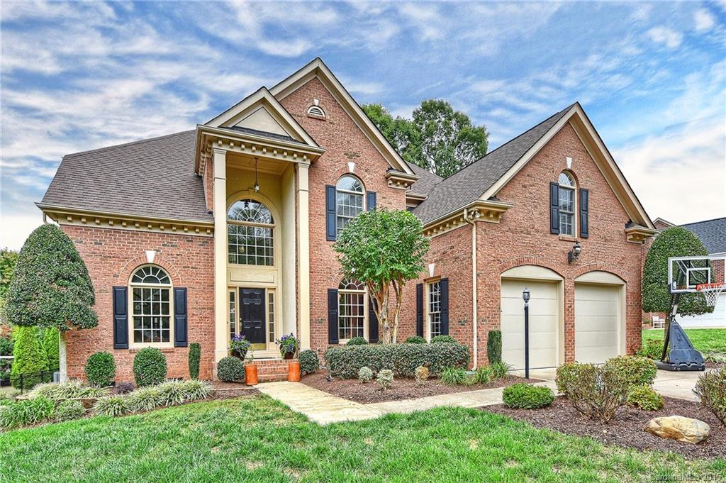 Motivated sellers!! Beautiful brick home in River Run C. C, a golf community located in the quaint  town of Davidson.  Wood floors throughout first floor and master BR. 2 story entry. Updated kitchen has granite counters, stainless appliances and custom backsplash. This is a great home for entertaining with a bright and open kitchen and family area. Upscale master bath has loads of tile, granite, and an oversized shower. Upstairs features 3 full baths and new carpet. Roof 2011 and AC 2012, 2013
