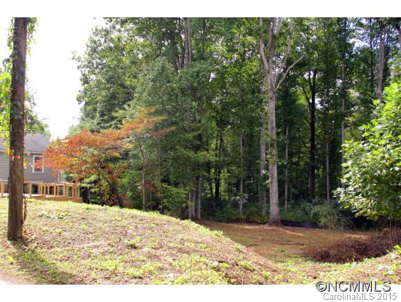 Fantastic Downtown Brevard Lot. Great building spot on large downtown parcel with a creek in the back yard. Private wooded property with mature trees. Perfect for your dream home all within a short distance to downtown shopping, dining and bike paths.
