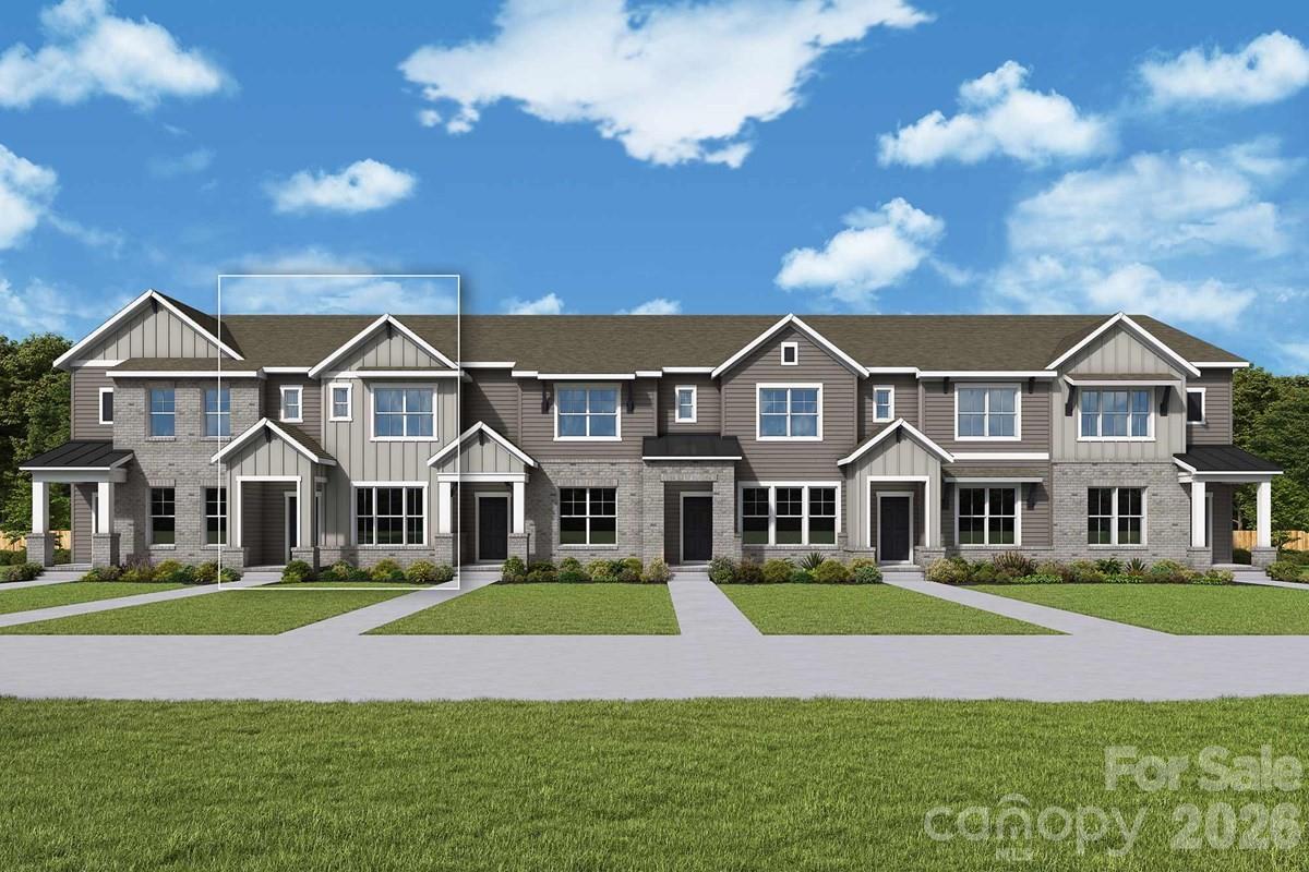 Discover an exceptional end-unit townhome that rises far above the typical builder cookie-cutter design—offering new-construction quality, great warranties, and truly low-maintenance living with lawn care included. From its upgraded finishes to its thoughtful layout, this home delivers comfort, convenience, and style in every detail.

This spacious 3-bedroom, 2.5-bath home includes a flexible second-floor loft—perfect for an office, media room, or additional lounge space. The beautifully designed kitchen features 42-inch Benton Birch cabinets with an Arid stain, complemented by elegant Calacatta Villa quartz countertops, sleek black fixtures and hardware, and a gas range ideal for cooking enthusiasts.

Luxury vinyl plank flooring flows throughout the entire first floor and up the stairs, creating a cohesive and durable living space. As an end unit, the home enjoys added natural light and privacy, enhancing the airy, open feel.

Built with superior materials and craftsmanship, the home includes Hardie Plank siding and 2x6 advanced construction walls for strength, insulation, and long-lasting performance. It also meets the Environments for Living® Gold Standard for energy efficiency—providing year-round comfort and long-term savings. A 2-car garage adds everyday convenience and storage.

Perfectly located near restaurants, shopping, and local conveniences, this home offers unmatched accessibility—and the highly anticipated new Target-anchored shopping complex coming to the area will make the location even more desirable.

A stylish, energy-efficient end-unit townhome with modern upgrades and low-maintenance living—this is a place you’ll love to call home.