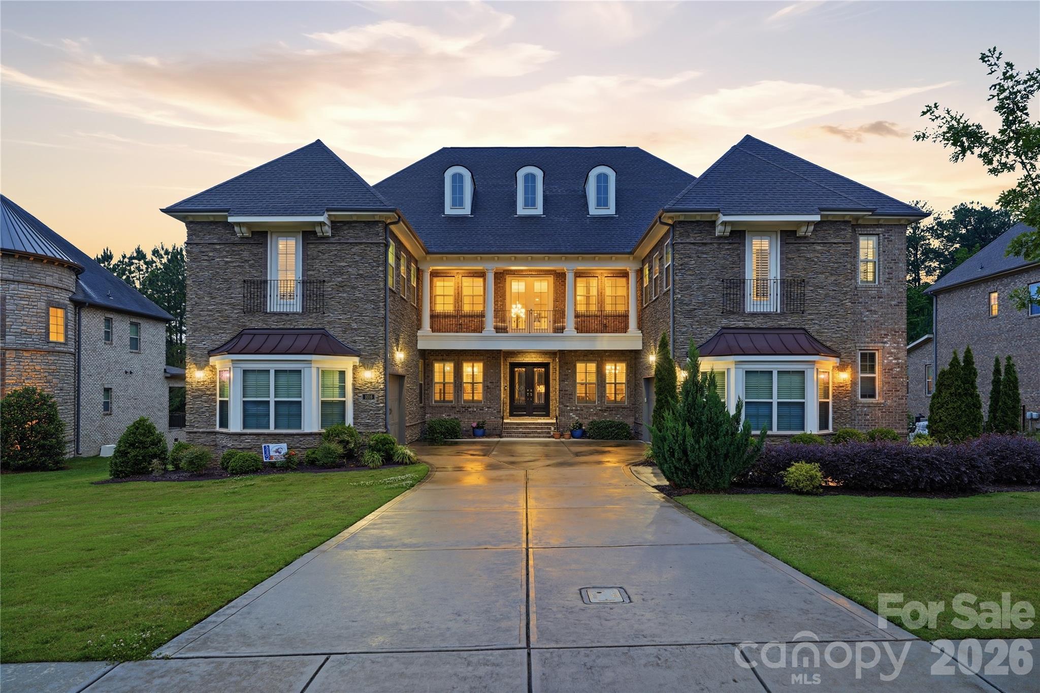 Located in a gated community in the acclaimed Marvin school district, this amazing four-sided brick house has 5 bedrooms, 5.5 baths, and a three-car garage. The main floor is an entertainer’s dream, featuring a modern kitchen with floor-to-ceiling cabinets, an expansive island, two dishwashers, and a butler’s pantry. The impressive two-story living room includes a fireplace and plenty of room for oversized couches and extra dining options. Florida doors open the living room to a back porch that includes a fireplace, a retractable screen, and view of the custom built, saltwater pool with a tanning ledge, waterfall feature, and plenty of beautiful sunsets.
The main floor also includes a large master bedroom that looks out into the pool and private backyard. The master suite features a spa bathroom with an oversized shower and a huge walk-in closet. Also on the main floor is a second bedroom with a full bathroom including a walk-in shower that is perfect for guests or in-laws. Tucked away behind the kitchen on the main floor is a small office and a flex room that is perfect for a small gym or a larger office. The second floor continues to impress with a large media room wired for multiple televisions (perfect for gaming) and enclosed by a beautiful glass wall. A separate media room equipped with built-in cabinets, a wet bar, and a closet can be used as a bedroom. Three additional bedrooms, each with a full bathroom, are also located on the second floor (one of those bedrooms is oversized and could easily be converted into a second master). This home is equipped with built-in speakers in the living room, dining room, kitchen, and one upstairs media room. Please note that the listing agent is related to the seller.