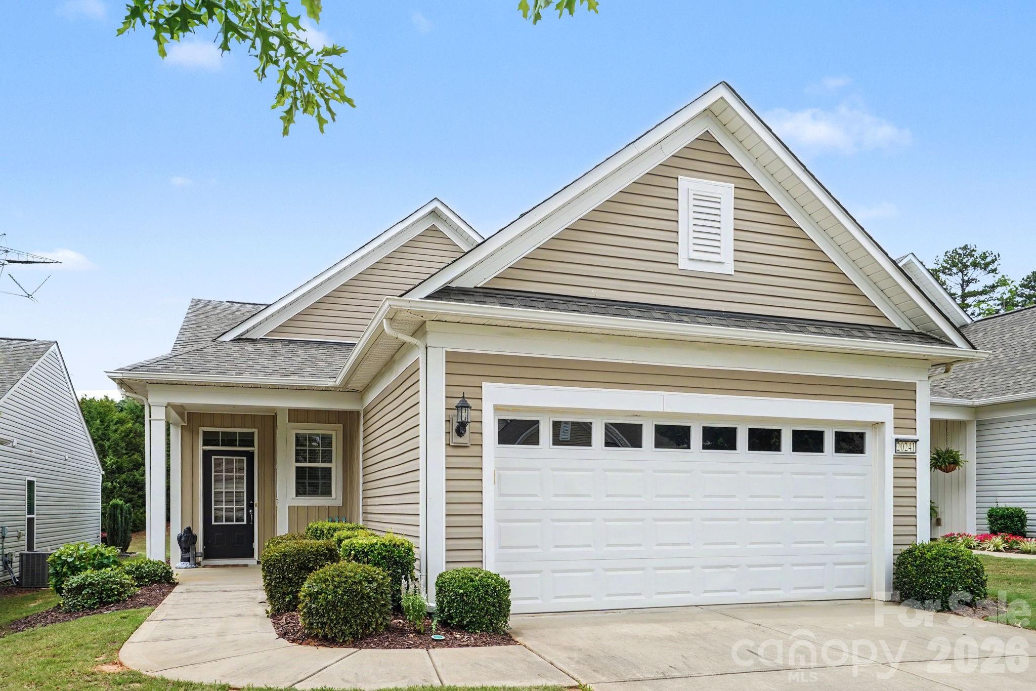 Welcome to this beautifully maintained 2-bedroom, 2-bath home located in the highly desirable Sun City Carolina Lakes, a premier 55+ active adult community in Indian Land. Offering comfortable one-level living, this home features an inviting open floor plan designed for both everyday living and entertaining. The spacious living area flows seamlessly into the kitchen and dining space, creating a bright and welcoming atmosphere. The primary suite offers a private retreat with an en-suite bath and generous closet space, while the secondary bedroom and full bath provide flexibility for guests, hobbies, or a home office.

One of the standout features of this home is the enclosed patio, providing additional year-round living space that's perfect for relaxing with your morning coffee, enjoying a good book, or entertaining friends regardless of the weather. Step outside to a fully fenced backyard, offering privacy and a secure outdoor area for gardening, outdoor dining, or simply enjoying the peaceful surroundings.

The attached two-car garage provides ample storage and convenience, while the home's thoughtful layout maximizes comfort and functionality. Whether you're looking to downsize without sacrificing quality or simply enjoy a low-maintenance lifestyle, this property offers an excellent opportunity.

Residents of Sun City Carolina Lakes enjoy access to an impressive collection of resort-style amenities, including clubhouses, indoor and outdoor pools, fitness facilities, walking and biking trails, tennis and pickleball courts, golf, social clubs, and a full calendar of activities. Conveniently located near shopping, dining, healthcare, and major roadways, this home combines everyday convenience with an active lifestyle in one of the area's most sought-after 55+ communities. Don't miss your opportunity to own this move-in ready home with the added bonus of an enclosed patio and fenced backyard in beautiful Sun City Carolina Lakes.