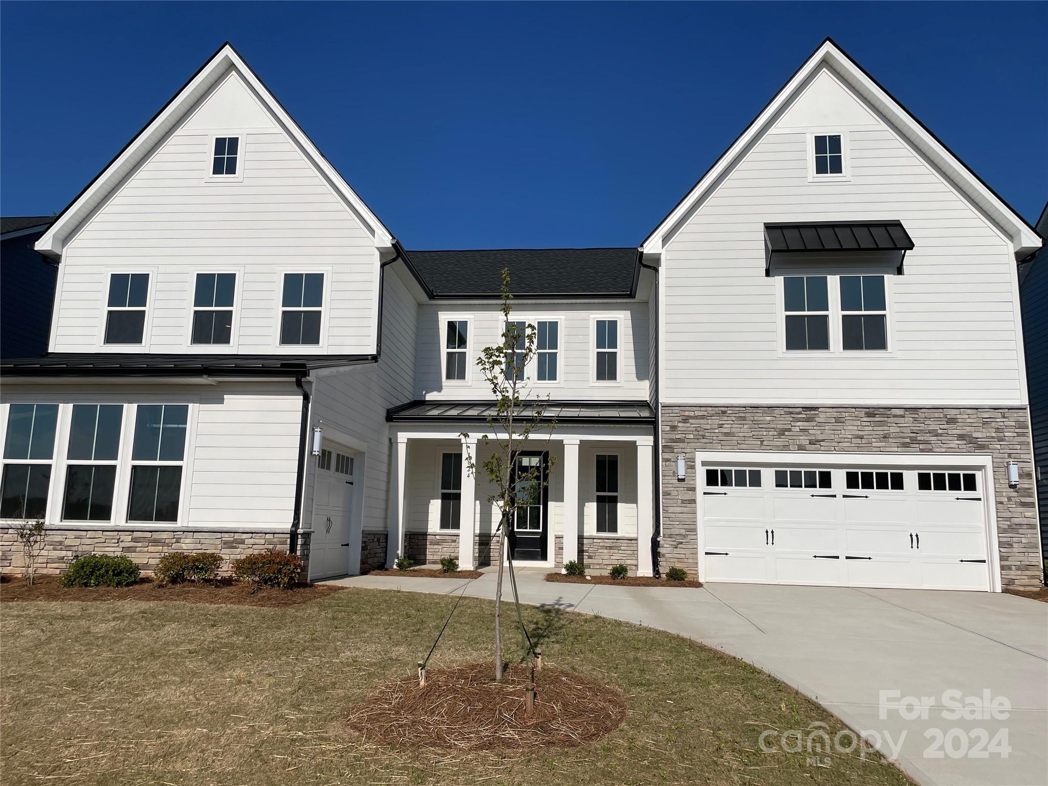Beautiful new construction neighborhood and great location near Ballantyne. Lovely 2story foyer welcomes you as you enter the spacious great room with gas fireplace, perfect for entertaining. Enjoy the outdoors from your covered patio and fully sodded yard. The kitchen is a chef's delight with a gas cooktop, a hood vented to the outside, built in microwave/oven plus a large walk in pantry. Lovely primary bedroom with spa like bathroom with separate shower, free standing tub and 2 walk in closets. Beautiful open staircase with wood treads leads to 2nd floor loft. Jack and Jill Bedroom/Bathroom. Perfect for multi-generational families with 1st floor guest suite, a walk in closet, private bath with a tiled shower.