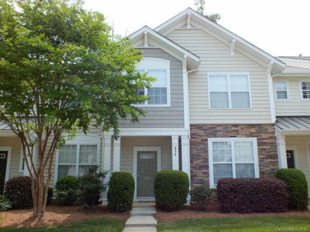 This lovely 3 bedroom, 2 1/2 bath townhouse is in a beautiful quite neighborhood with playground, walking trails, pool, clubhouse and pond. Open floor plan with wood and tile floors. All appliances stay including refrigerator, washer and dryer. Security system included.  It has backyard privacy backing up to woods. Conveniently located to schools, shopping and restaurants. It is a must see!
