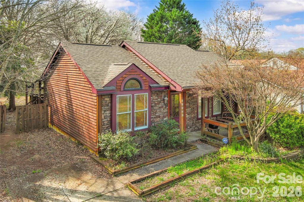 Not your typical cookie cutter home- this is so much more !!Welcome to this charming ranch retreat tucked away in the back of Taragate Farms! Situated on a private, tree-lined 0.34-acre fenced lot, this inviting 3-bedroom, 2-bath home offers the perfect blend of peaceful living and everyday convenience. With no HOA and a serene backyard surrounded by mature greenery and bamboo for added privacy, this property feels like your own hidden escape in the heart of Charlotte.

Inside, you’ll love the bright open layout featuring hardwood floors throughout, soaring vaulted ceilings, and spacious living and dining areas designed for comfortable everyday living and effortless entertaining. The oversized kitchen flows seamlessly into the main living spaces, creating a warm and welcoming atmosphere.

Step outside to the large covered back deck overlooking the private backyard — the ideal setting for morning coffee, weekend gatherings, or relaxing evenings under the trees. Conveniently located near shopping, dining, entertainment, and major commuter routes in sought-after Steele Creek, this move-in-ready home offers privacy, charm, and one-level living all in one.