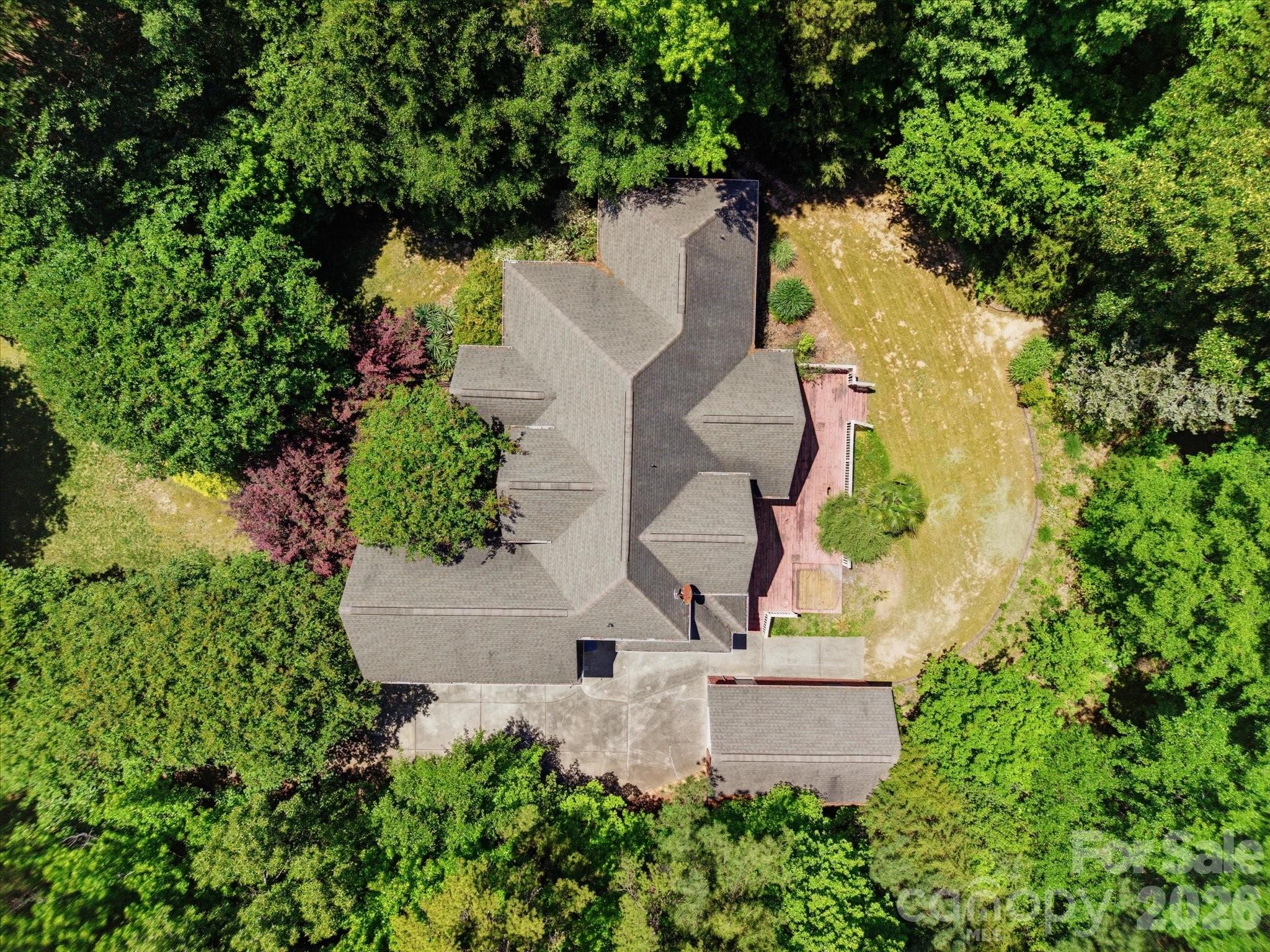 Beautiful full brick home on 1.8 acres in desirable Beckenham neighborhood! This home has so much potential with  approximately 2,900 square feet of living space. Primary located on main floor as well as office or potential guest bedroom with full bath access nearby. Hardwood floors throughout dining room and great room. Cathedral ceiling in great room and built in cabinets in great room with tons of natural light. Spacious kitchen with window sink, large island and breakfast area. Laundry room with cabinetry and side entrance. Upstairs you'll find two additional bedrooms and a large bonus room. This is a great home for someone looking to downsize but loves the features of a custom built home. Home needs a little updating and deck will need to be replaced. Two car garage and detached one car garage. Home is pre inspected and sold "as is". Inspection report available upon request.