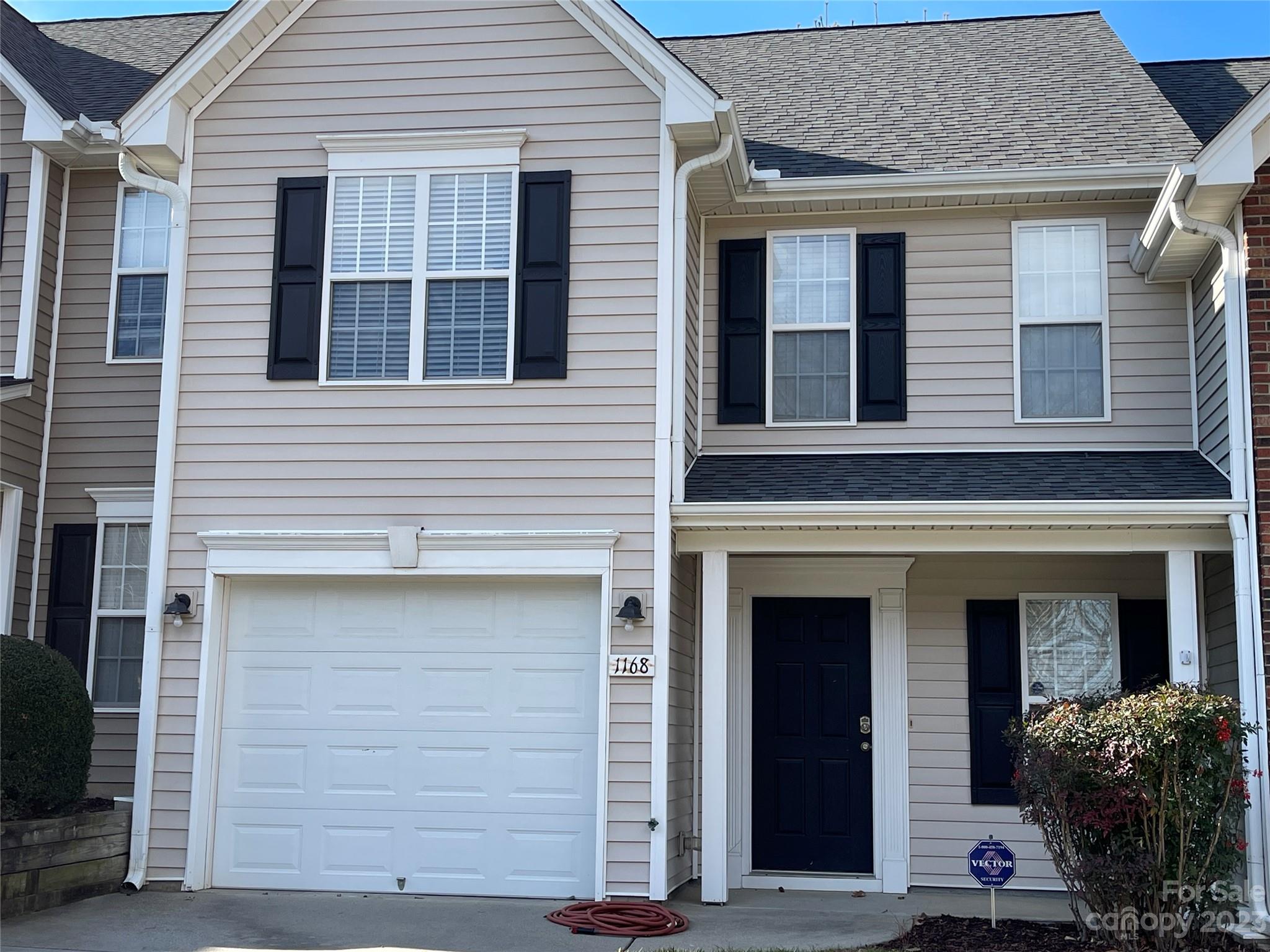 Lovely townhome in popular neighborhood! Attached 1 car garage + driveway parking. Attractive layout with new bamboo flooring, granite counters and freshly painted walls. Great room has soaring ceiling! Separate dining room could be used for office, exercise, or other uses. Spacious kitchen has stainless steel appliances with eat-in area that leads to private, relaxing patio. Nice space behind unit with some nicely landscaped land between units. Convenient 1/2 bath on main level. Both bedrooms upstairs are large and plenty of closet space! Double sink vanity in primary bathroom. Both bedrooms have their own full bath. Pull down attic stars for storage.