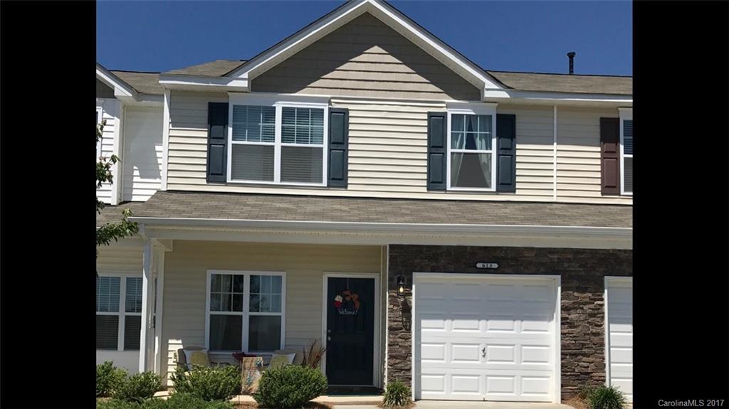 JUST REDUCED! Excellent Clover Schools! Sought after Lake Wylie area. Beautiful open & bright town home w custom paint colors, hardwoods on main, modern white kit, granite & subway tile splash, nice foyer cubby, wainscoting. Huge master closet & extra lg foyer closet. Dbl driveway & extra parking. Private patio. Low taxes. Convenient to Clt, airport, shopping & restaurants. Minutes from the lake! MUST SEE!