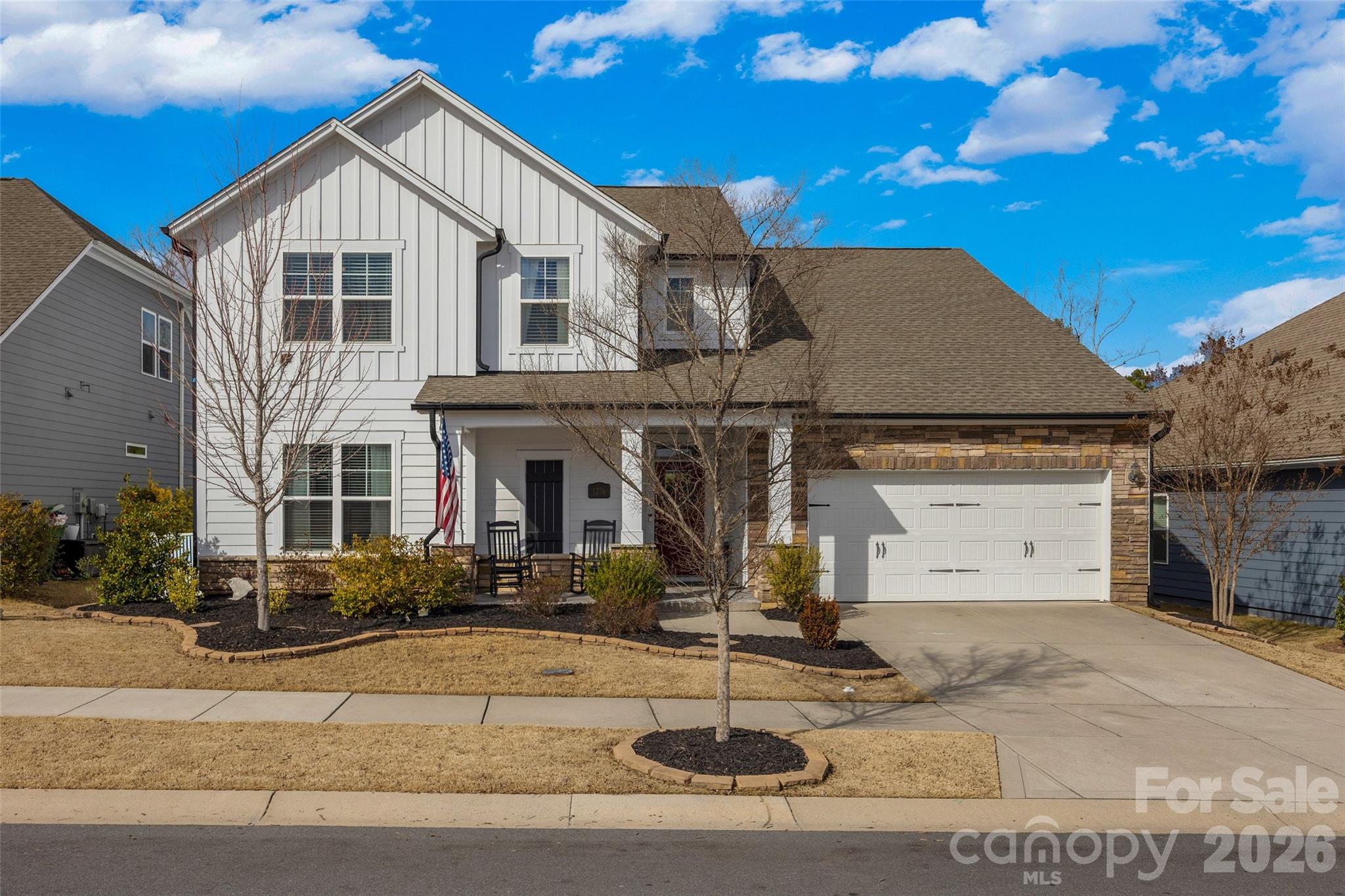 Beautifully maintained 5 bedroom, 3 full bathroom home in the well sought after neighborhood of Massey, located in the award-winning Fort Mill School District. As you enter the home you're greeted with an inviting foyer with large ceilings and custom woodwork, making the space warm and inviting. An open concept living room w/ a gas log fireplace and large windows, bringing in tons of natural light. The kitchen is equipped with tons of granite countertop space for cooking, plenty of cabinets for storage and a large pantry with custom wood shelving. It flows seamlessly into the breakfast area creating an open feel that's perfect for everyday living and entertaining.  Downstairs you'll also find an office w/ built-ins and french doors, a full bedroom and full bathroom, perfect for a guest room or a playroom. Upstairs is 4 additional bedrooms, the laundry room and 2 full bathrooms. This home is situated right in front of a large flat green space, perfect area for kids to run around and play while you relax on the front porch. Don't forget about all the amazing amenities this neighborhood has to offer including a fitness center and pool. You won't want to miss this opportunity.