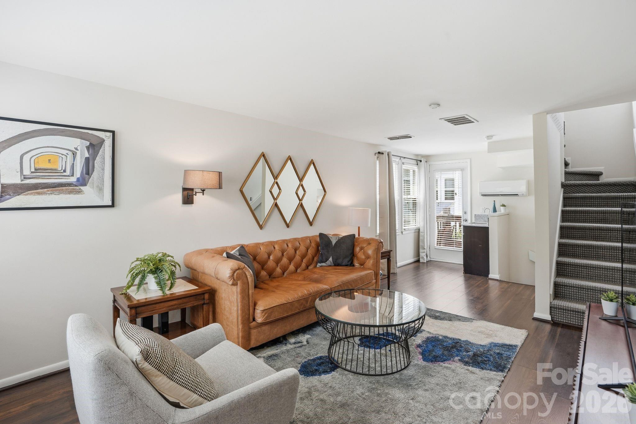 Welcome to a distinctive end-unit condo in the heart of Uptown Charlotte’s historic Fourth Ward. Its three-level, townhouse-style design offers exceptional separation and privacy, with dedicated spaces for living, dining and sleeping. Highlights include an updated kitchen, in-unit laundry, an assigned parking space and an added bonus, the HVAC system was replaced in 2022! Step outside to Fourth Ward’s picturesque, tree-lined streets and enjoy easy access to coffee shops, restaurants, nightlife and public transportation. Bank of America Stadium—home of the Carolina Panthers and Charlotte FC—Truist Field, Spectrum Center, Discovery Place Science, Blumenthal Performing Arts Center and Fourth Ward Park are all nearby. Optimist Hall, one of Charlotte’s most popular dining and gathering destinations, is also just minutes away. A standout feature for investors: this property currently has no short-term rental restrictions, making it an excellent opportunity for Airbnb, VRBO or other flexible rental strategies—a true rarity so close to Center City. Whether you’re looking for an income-producing investment, a stylish urban home or an Uptown pied-à-terre, this unique Fourth Ward property offers location, character and exceptional flexibility.