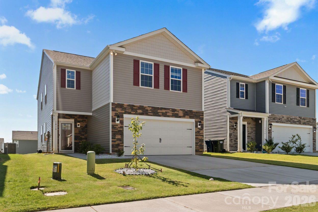 Skip the wait for new construction and enjoy the benefits of a nearly new home with thoughtful upgrades already completed beyond builder standards. Located in the desirable Hamptons at Hickory community, this Elston floor plan offers 2,214 square feet of well-designed living space with 4 bedrooms and 2.5 baths.

Unlike a brand-new build, this home has already completed its initial settling period, allowing early homeowner adjustments and routine builder-related items to be addressed—offering added confidence and peace of mind for the next owner.

Inside, you’ll find fresh interior paint throughout with stylish accent walls on the main level and professionally cleaned carpet for a true move-in ready feel. Thoughtful upgrades include additional closet shelving for improved storage, updated bathroom cabinetry and molding details, and an upgraded primary suite shower fixture.

Additional enhancements include a professionally finished and painted garage—an upgrade not typically included in new construction—updated Spectrum internet service, and a concrete pad for trash can storage, adding everyday convenience. A transferable new construction warranty provides added value and reassurance.

Ideally located on a street closest to community amenities, residents enjoy quick access to the pool and playground, enhancing both lifestyle and livability.

The Hamptons at Hickory is ideally situated in Viewmont, one of Hickory’s most convenient and established areas. Just minutes from downtown Hickory’s shops, dining, entertainment, concert series, and farmers markets, this location offers everyday ease with a strong sense of community. Lenoir-Rhyne University is just one mile away, making it ideal for campus access, sporting events, or university connections. Lake Hickory and the Riverwalk are also just minutes away for outdoor recreation.

This home is an excellent option for relocation buyers, first-time homebuyers, professionals, or those connected to Lenoir-Rhyne University who want modern construction, move-in readiness, and a highly convenient Hickory location.