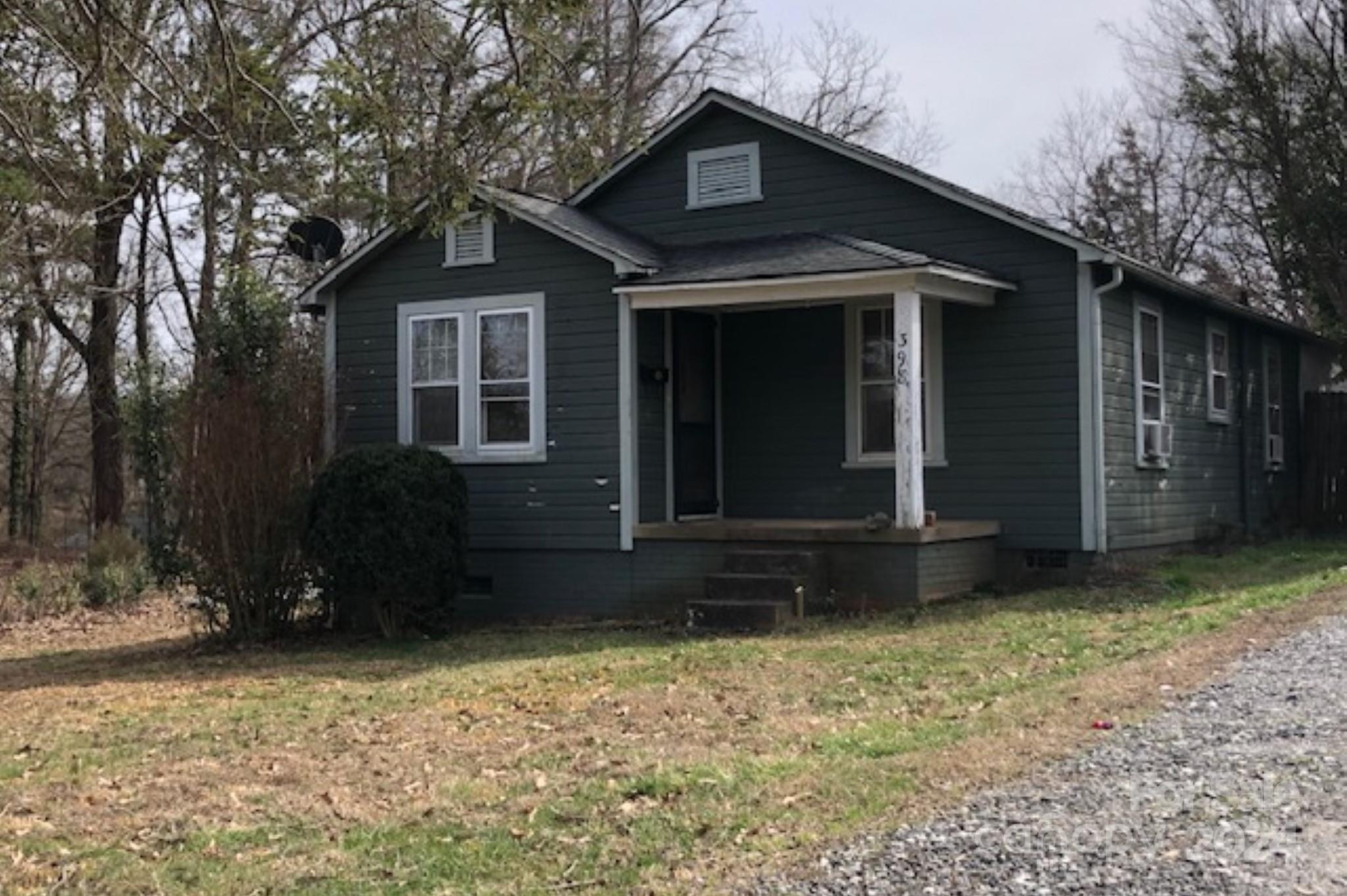 2BR/1BA Viewmont bungalow for under $100K!  Long time rental needs work, but has tons of potential & is priced accordingly.  Covered front porch & large covered rear deck. Sunny kitchen & dining area.  Detached  14' x 18' outbuilding w/ concrete floor has potential for garage, workshop, studio, etc. Gas furnace replaced in 2019 (Starnes H/A).  Superb location within short walking distance of Viewmont amenities, and only 5 minutes to the growing downtown.  Selling "As Is".  Seller will make no repairs.