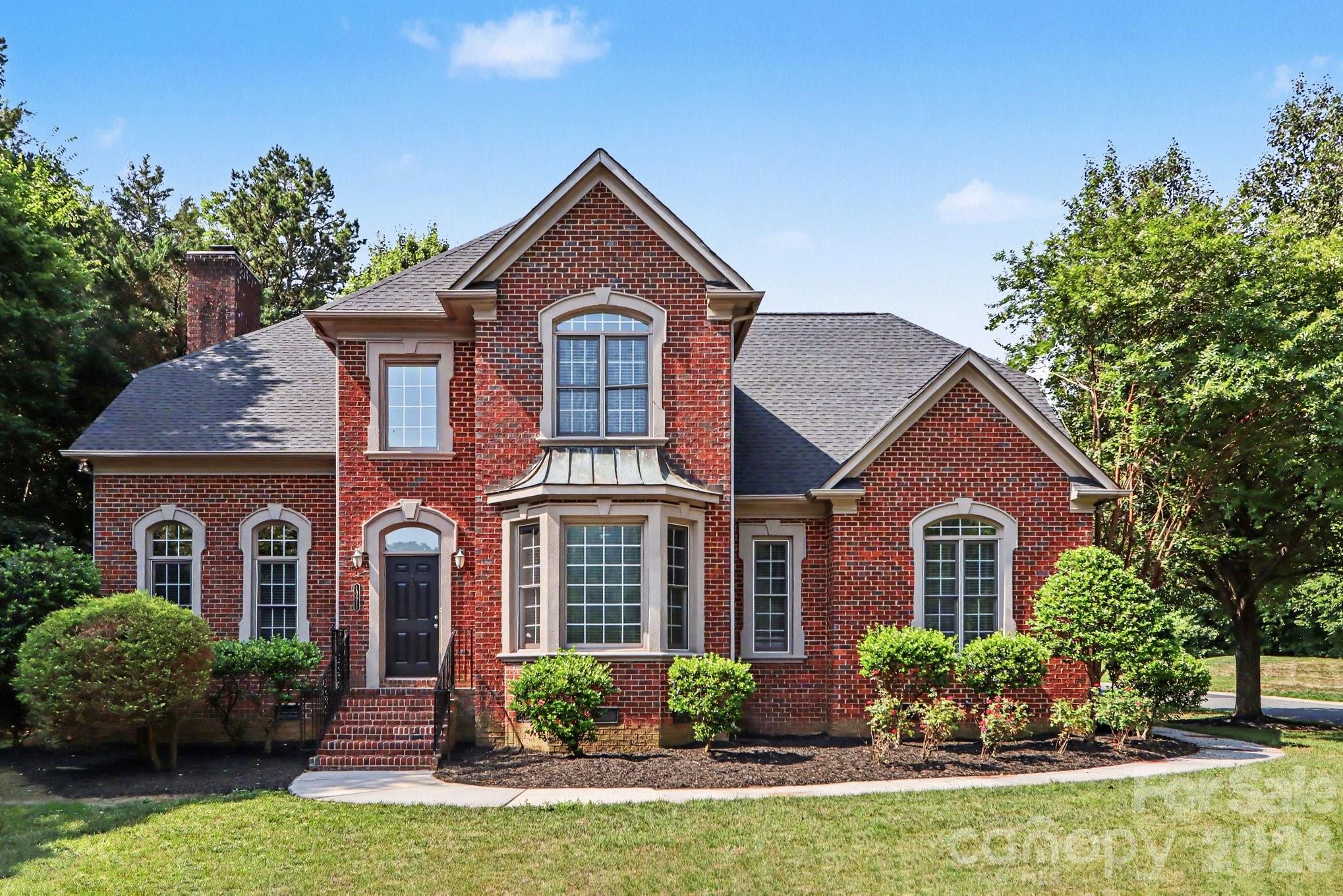 This move-in ready 4-bedroom, 2.5-bathroom home is located in the desirable River Run neighborhood, perfectly situated on a quiet cul-de-sac.The interior features a seamless open floor plan that integrates a huge living area, complete with a cozy fireplace as its centerpiece. The updated kitchen is a functional and stylish highlight, boasting granite countertops and stainless steel appliances. The home's layout is finished with a mix of carpet and wood flooring, and includes a dedicated laundry room for added convenience.The primary suite offers a private retreat featuring a large walk-in closet. Outside, the premium fenced lot provides a secure and private space that backs to greenspace, offering peaceful views. As a unique bonus, a robotic lawn mower is included with the home to maintain the yard effortlessly. The property also features an attached 2-car garage.Located in a vibrant community, Avery Park offers residents access to a dog park, playground, community garden, and the Plum Creek Greenway for miles of walking and biking trails. This prime location provides an easy commute and is just minutes away from Hough High, Bailey Middle, Bailey Road Park, downtown Davidson, Birkdale Village, and Lake Norman.Schedule your private showing today!