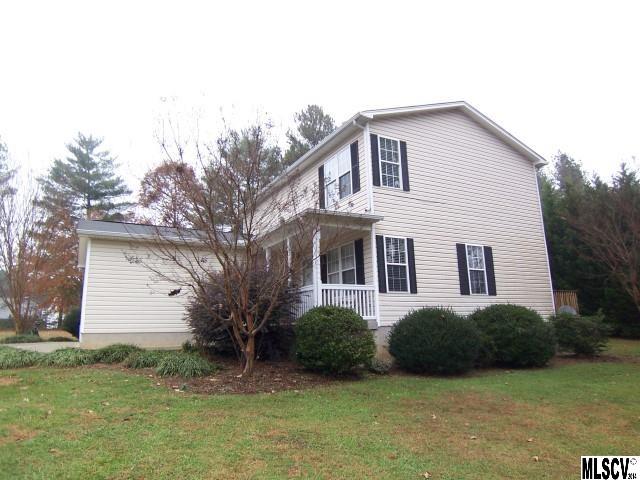 Move right in! Maintenance free home in Sherrills Crossing. Easy lake access close by. Brand new laminate flooring in great room an kitchen, new flooring in first floor bath and laundry room, first floor freshly painted, one new heat pump. Main floor has spacious great room, kitchen, half bath and garage. 2nd level has mstr suite with walk in closet, double sink vanity, garden tub & separate shower, 2nd and 3rd bedrooms and bath. Very nice level half acre yard. Private back deck plus relaxing front porch. Stop renting and own your own home! One heat pump is 2015, second heat pump 2000.